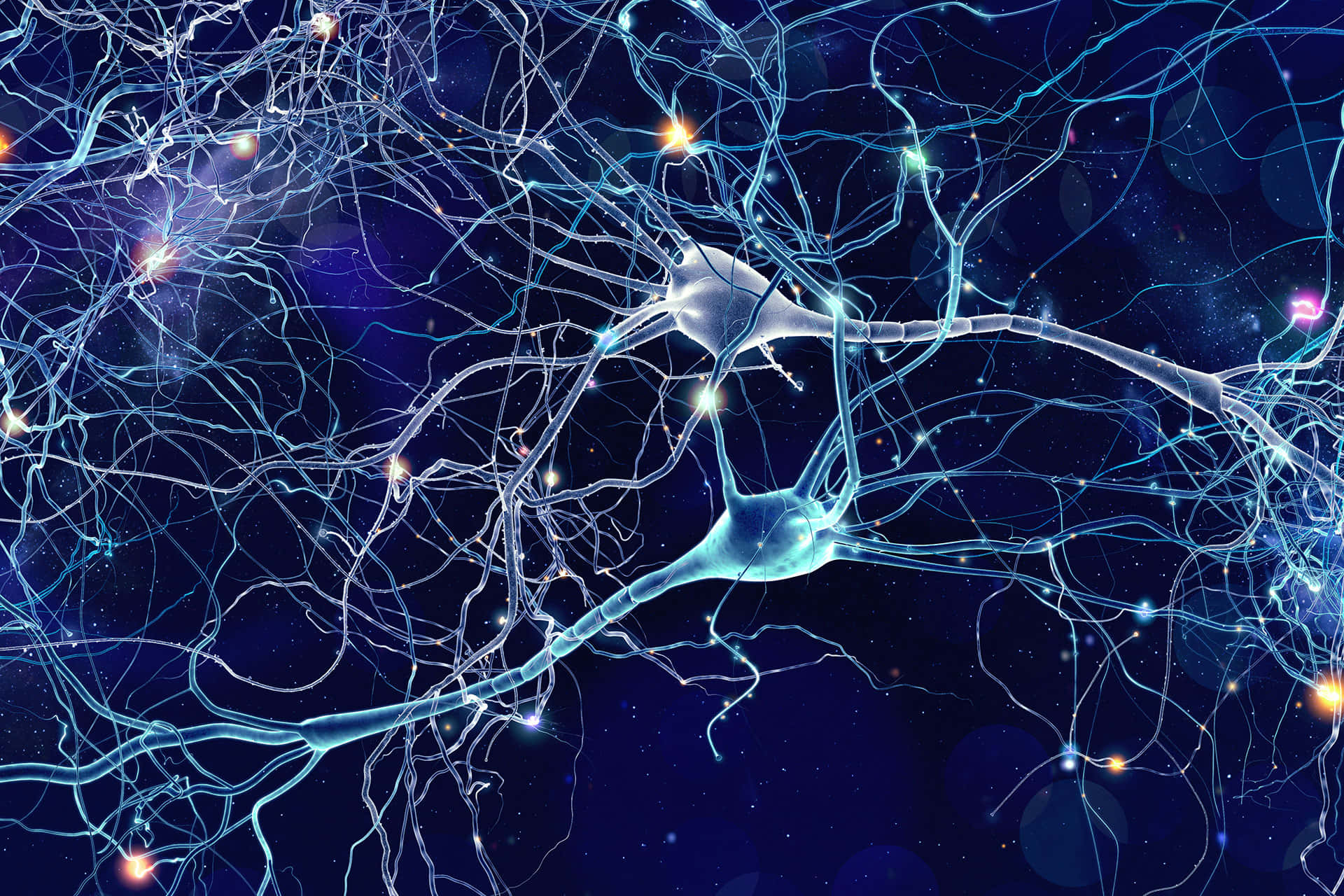 Psychology 桌布 壁紙 — 發光的藍色神經元，帶有分支樹突和突觸火花，背景是星光燦爛的宇宙。