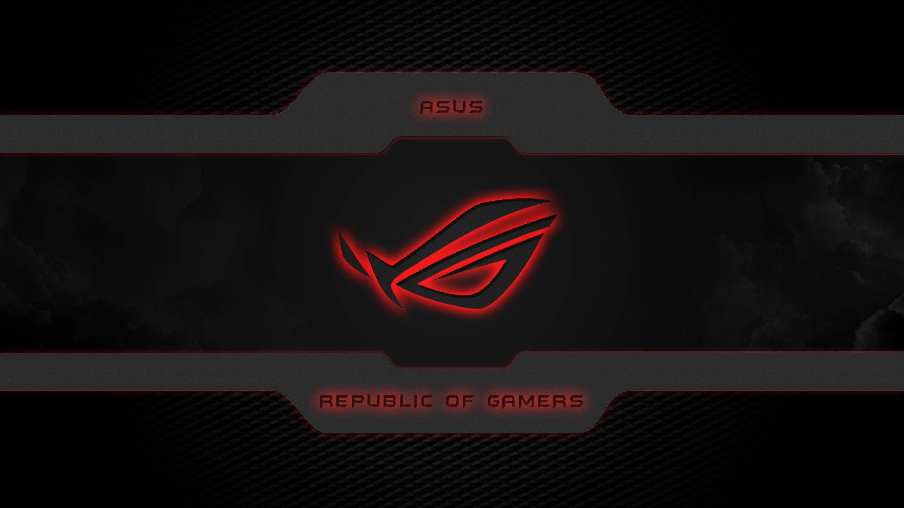 Asus Tuf Rog 壁紙 — 發光紅色ASUS ROG標誌置於深色碳纖維紋理背景中央，下方有「Republic of Gamers」文字。