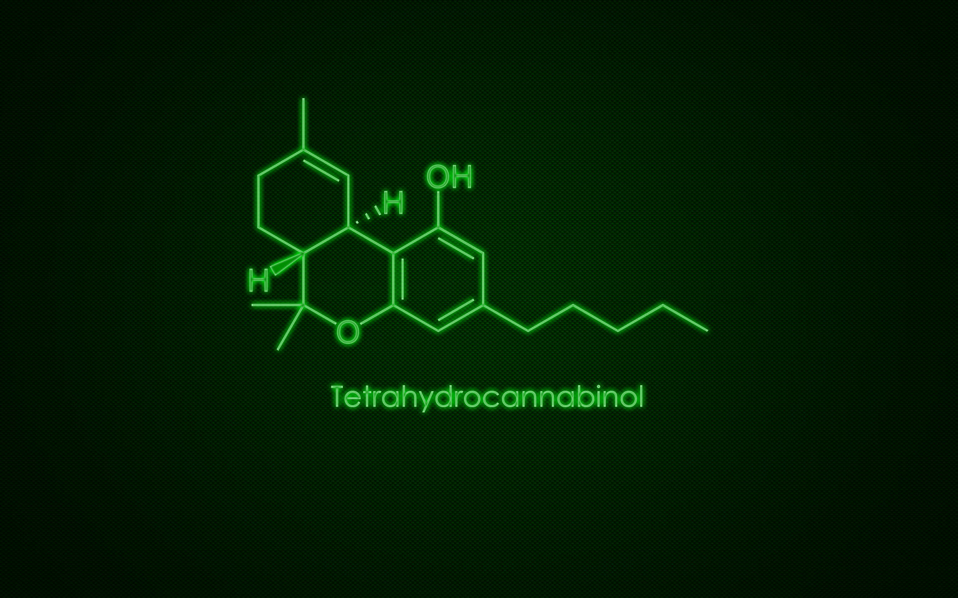 大麻 桌布 壁紙 — 發光綠色霓虹燈化學結構的四氫大麻酚在深色紋理背景上脫穎而出。