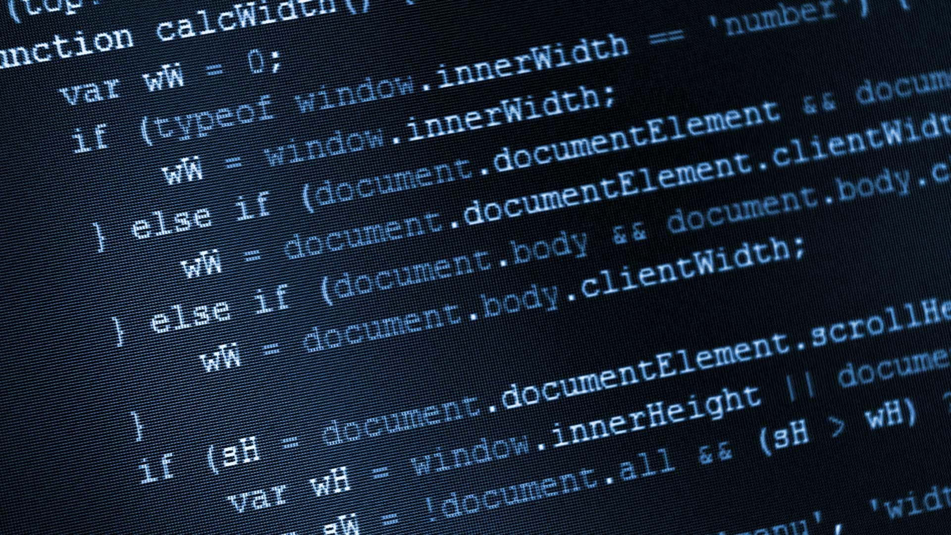 Information Technology 桌布 壁紙 — 發光藍色JavaScript代碼在暗色電腦顯示器螢幕上滾動的特寫。