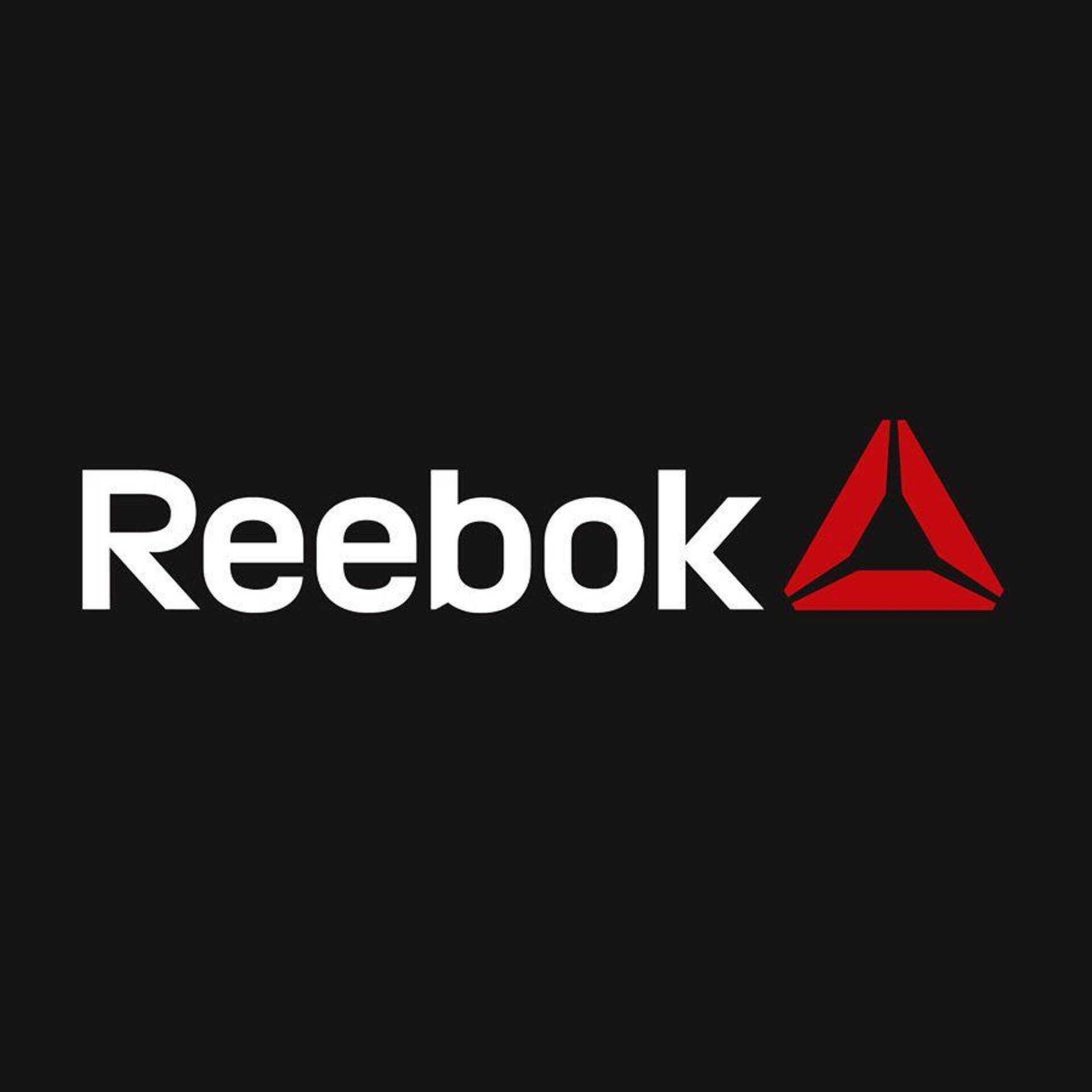黑色背景上帶有紅色三角形的Reebok品牌標誌