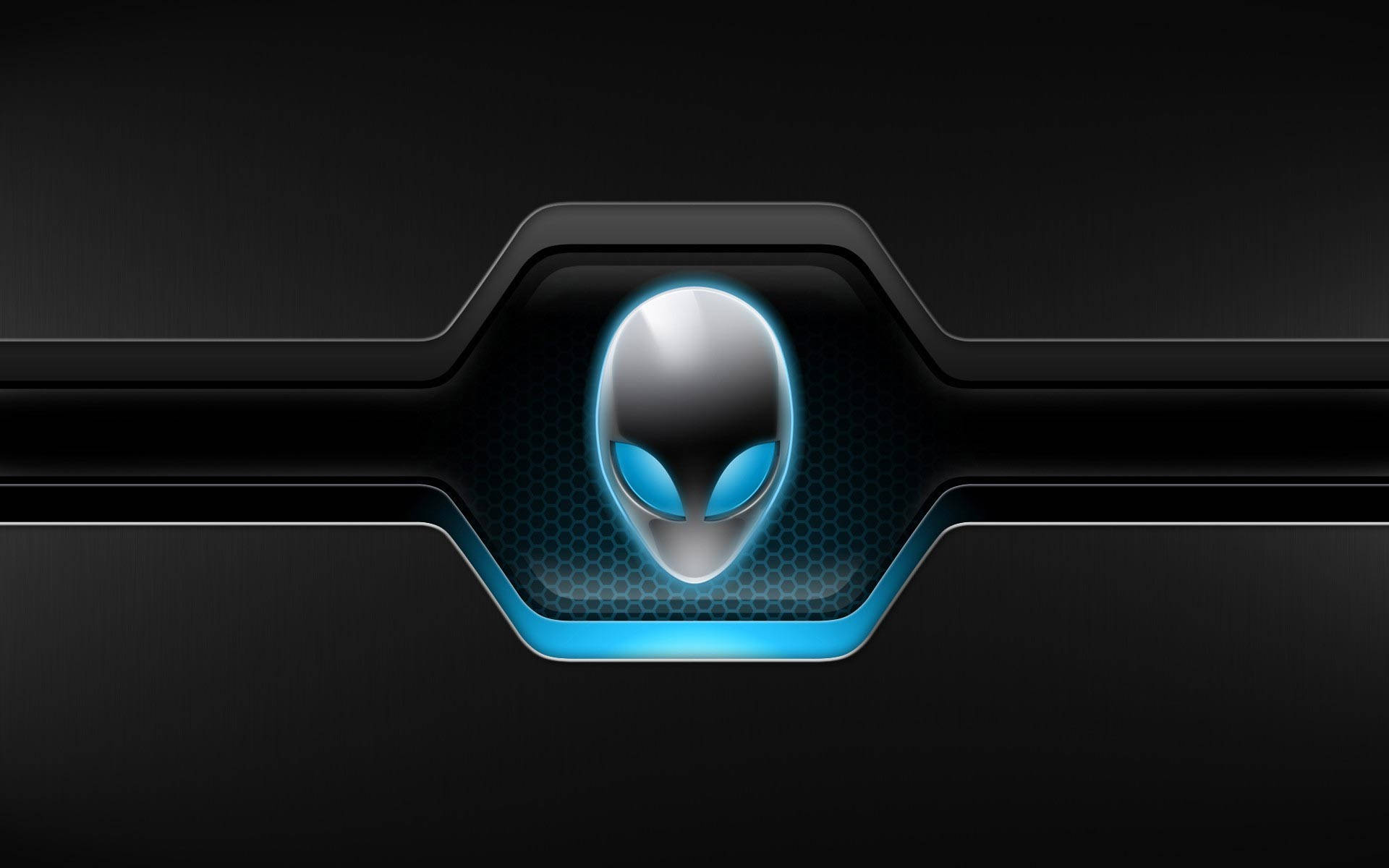 Alienware 標誌在黑色科技面板上發出藍光