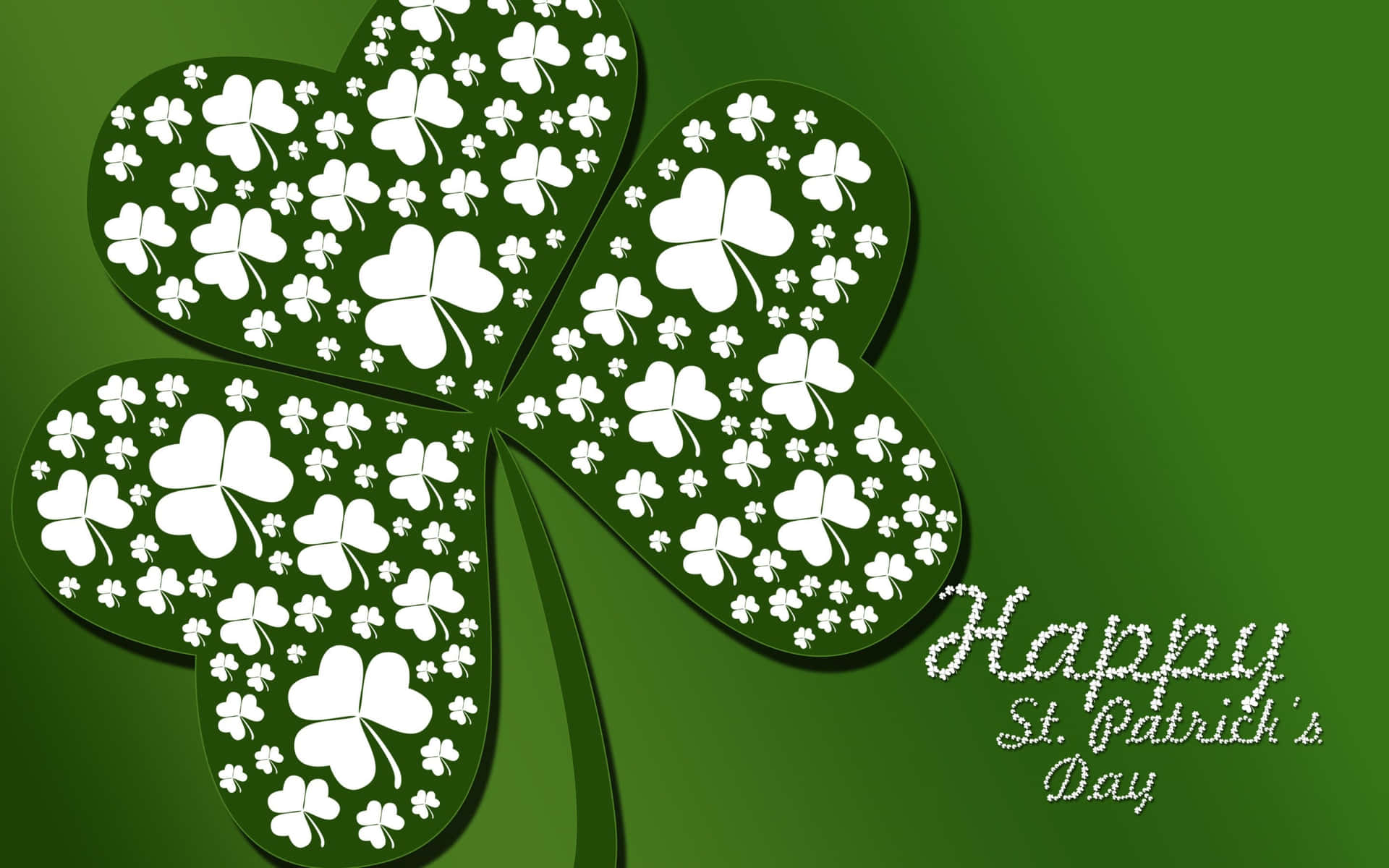 Happy St. Patrick's Day 問候，帶有大型四葉草設計。