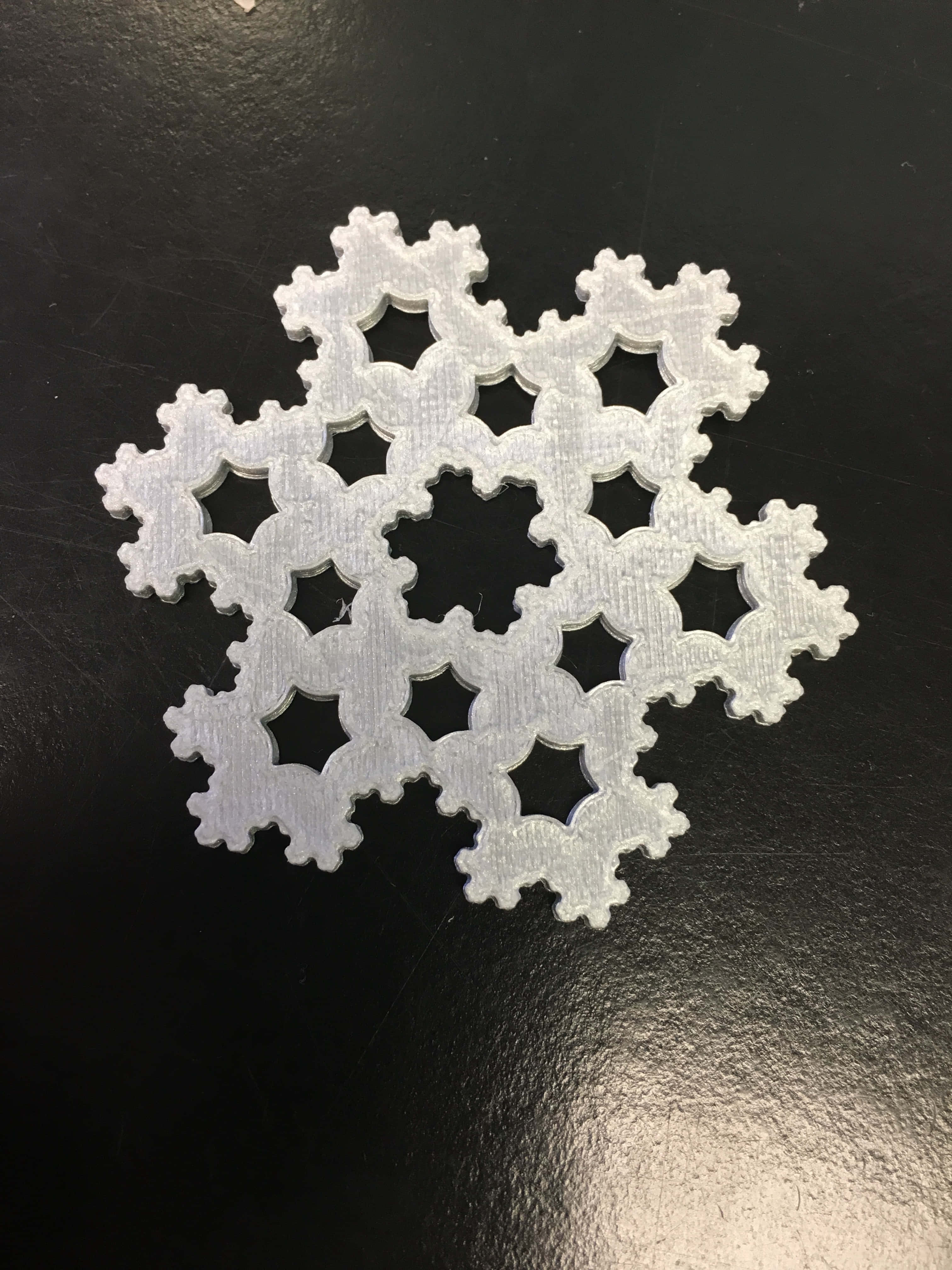白色塑膠製成的雪花 壁紙