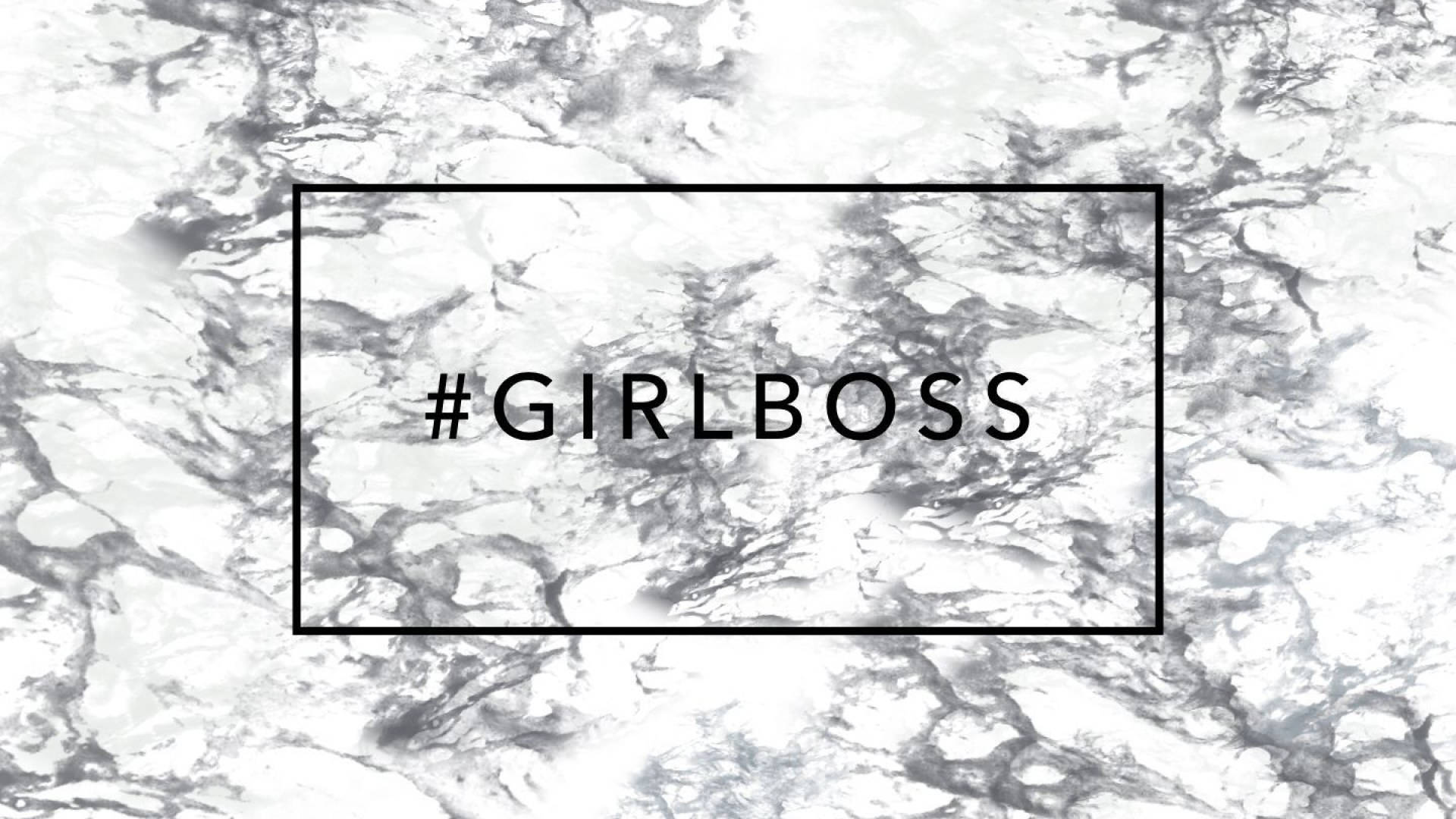 大理石背景上黑色盒子內的 girlboss hashtag