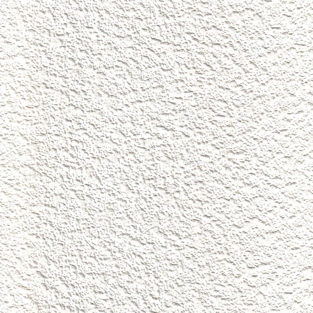 Pure White 桌布 壁紙 — 白色灰泥牆的特寫，表面粗糙有紋理，帶有微妙的陰影。