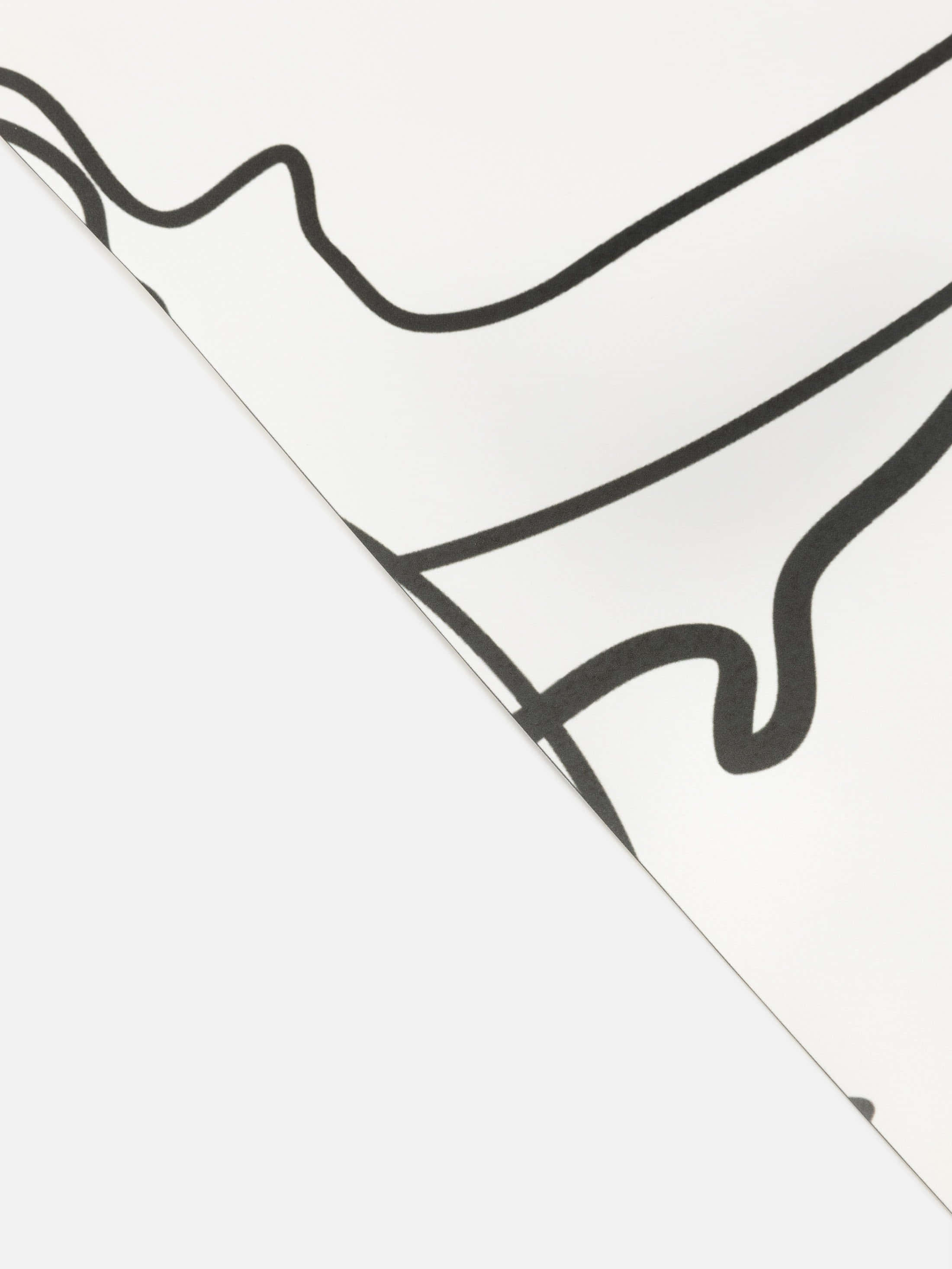 Clothing Design 桌布 壁紙 — 白色紙張上大膽黑色抽象線條的特寫，營造出簡約現代圖案。