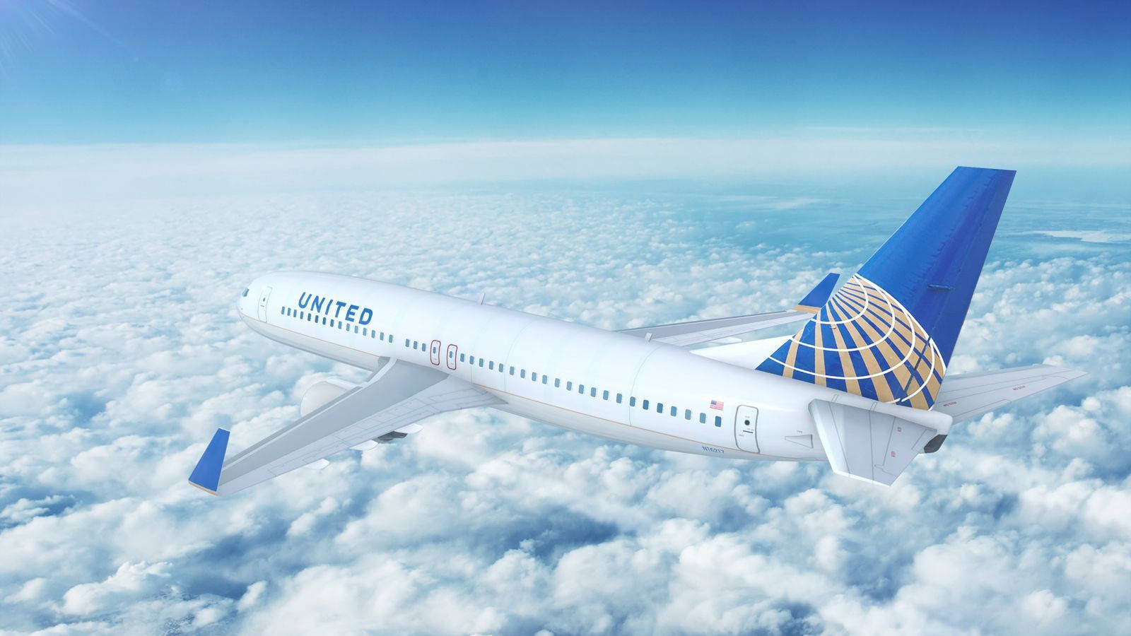 聯合航空飛機在蓬鬆白雲上方高高飛行。
