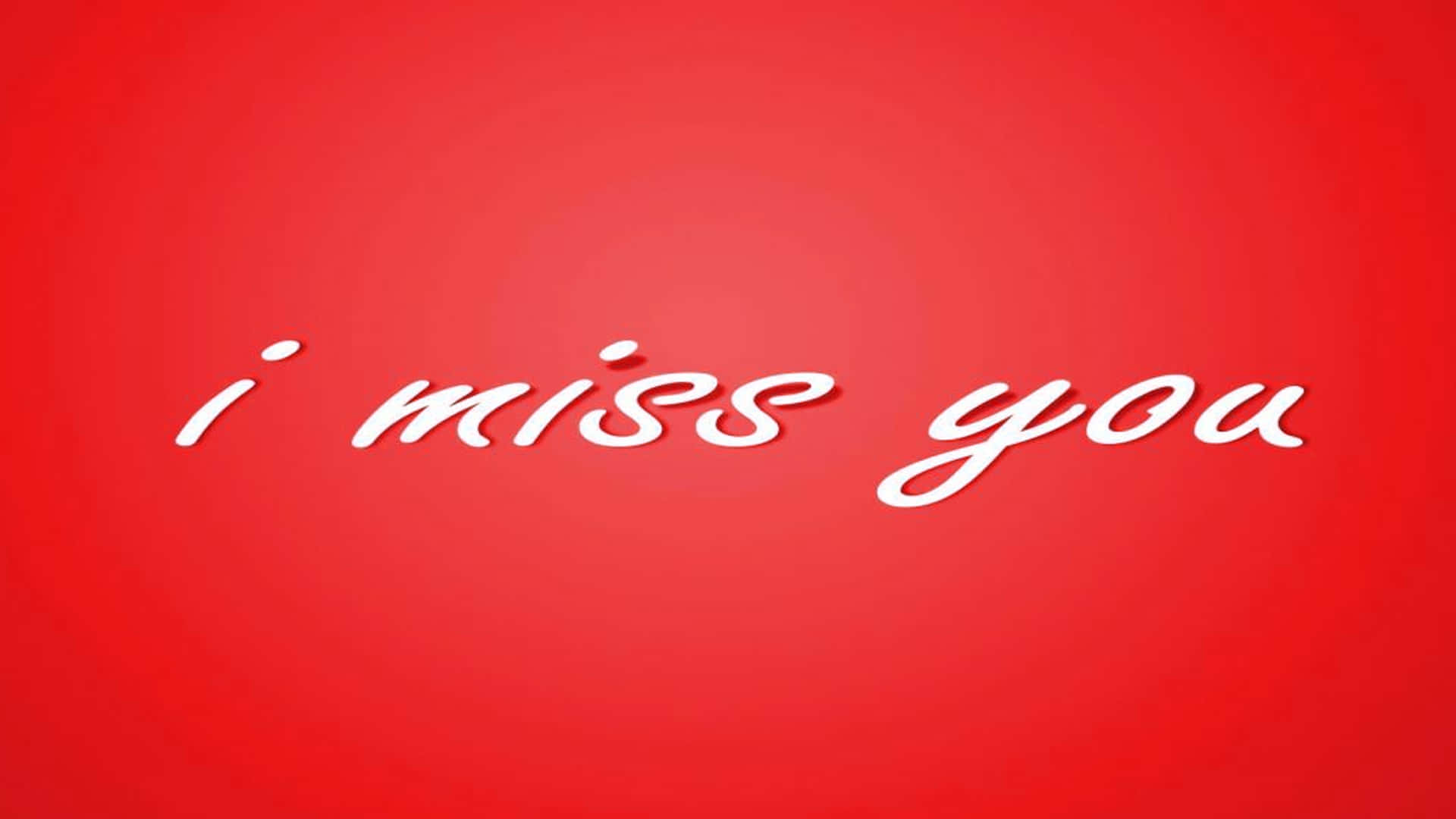 I Miss You 桌布 壁紙 — 白色草書文字「我想你」漂浮在帶有柔和光線的漸變紅色背景上。