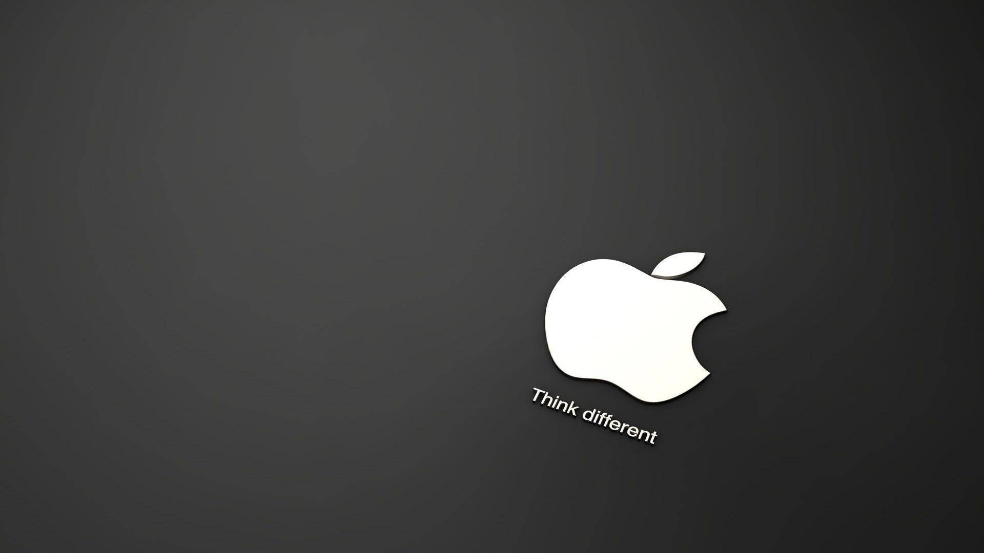 深灰色背景上的白色Apple標誌，帶有「Think different」標語。