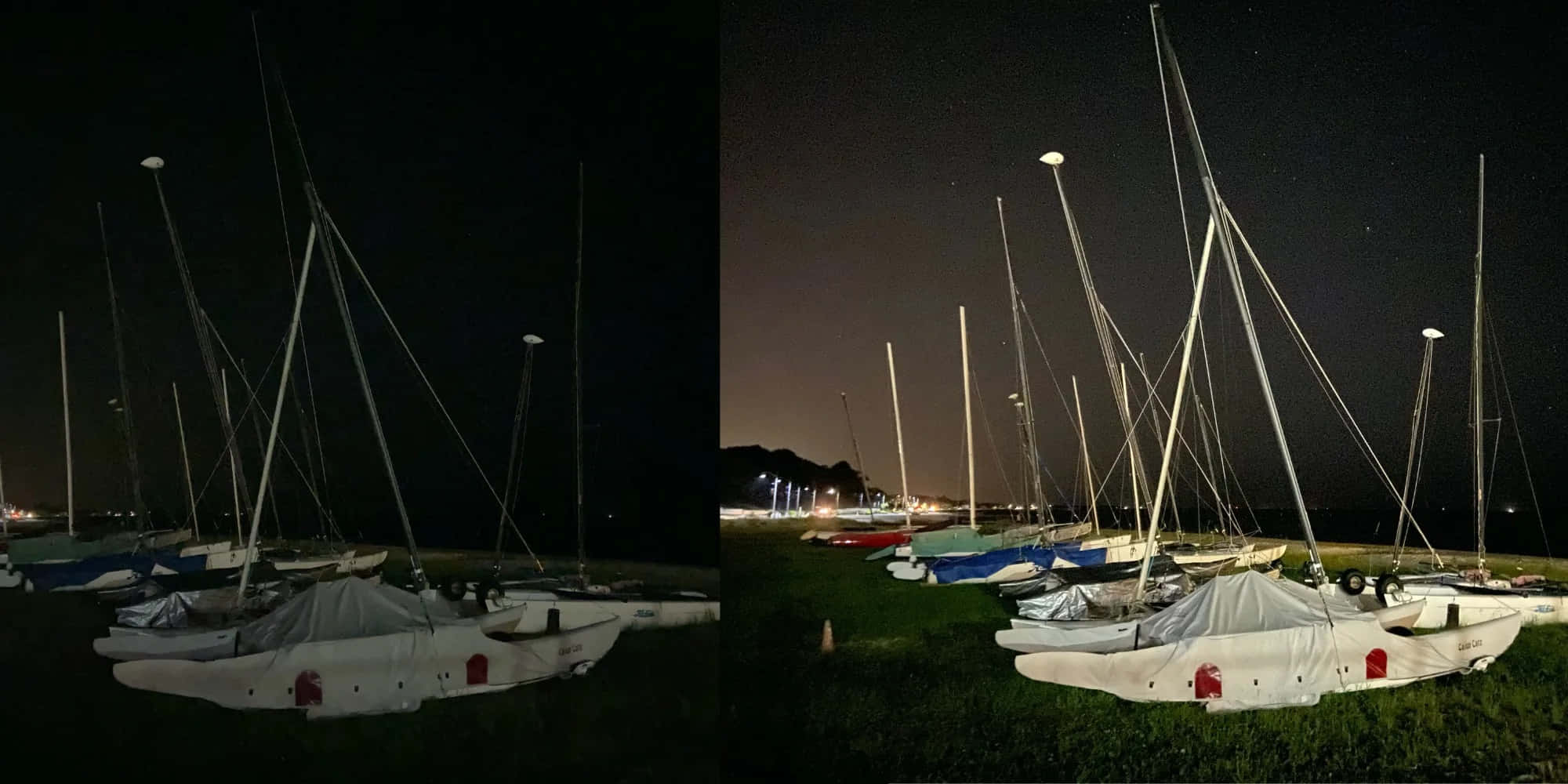 Night Mode 桌布 壁紙 — 白色防水布覆蓋的帆船在星空下的草地上休息，遠處的城市燈光閃爍。