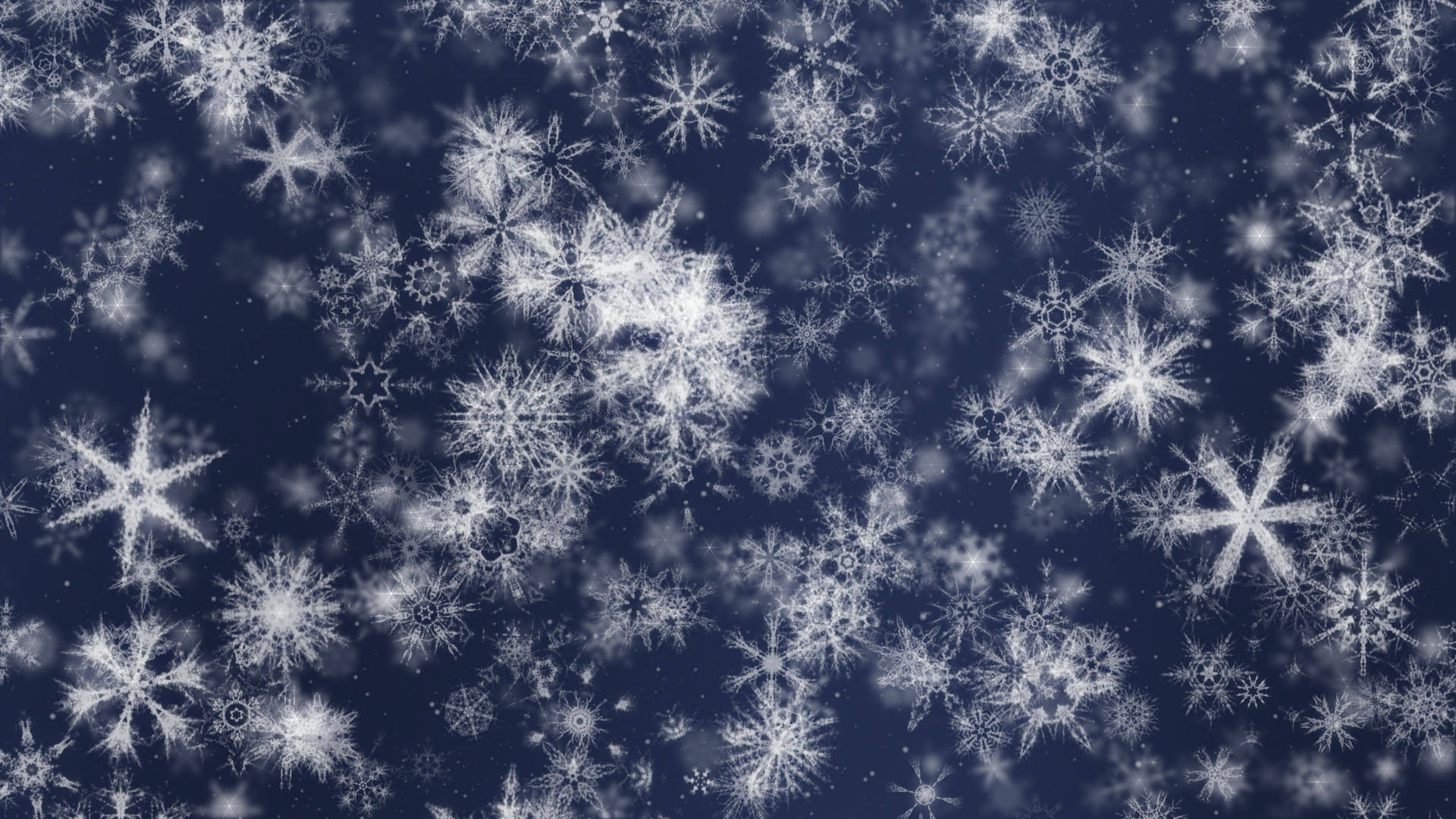雪花在深藍色天空中飄落