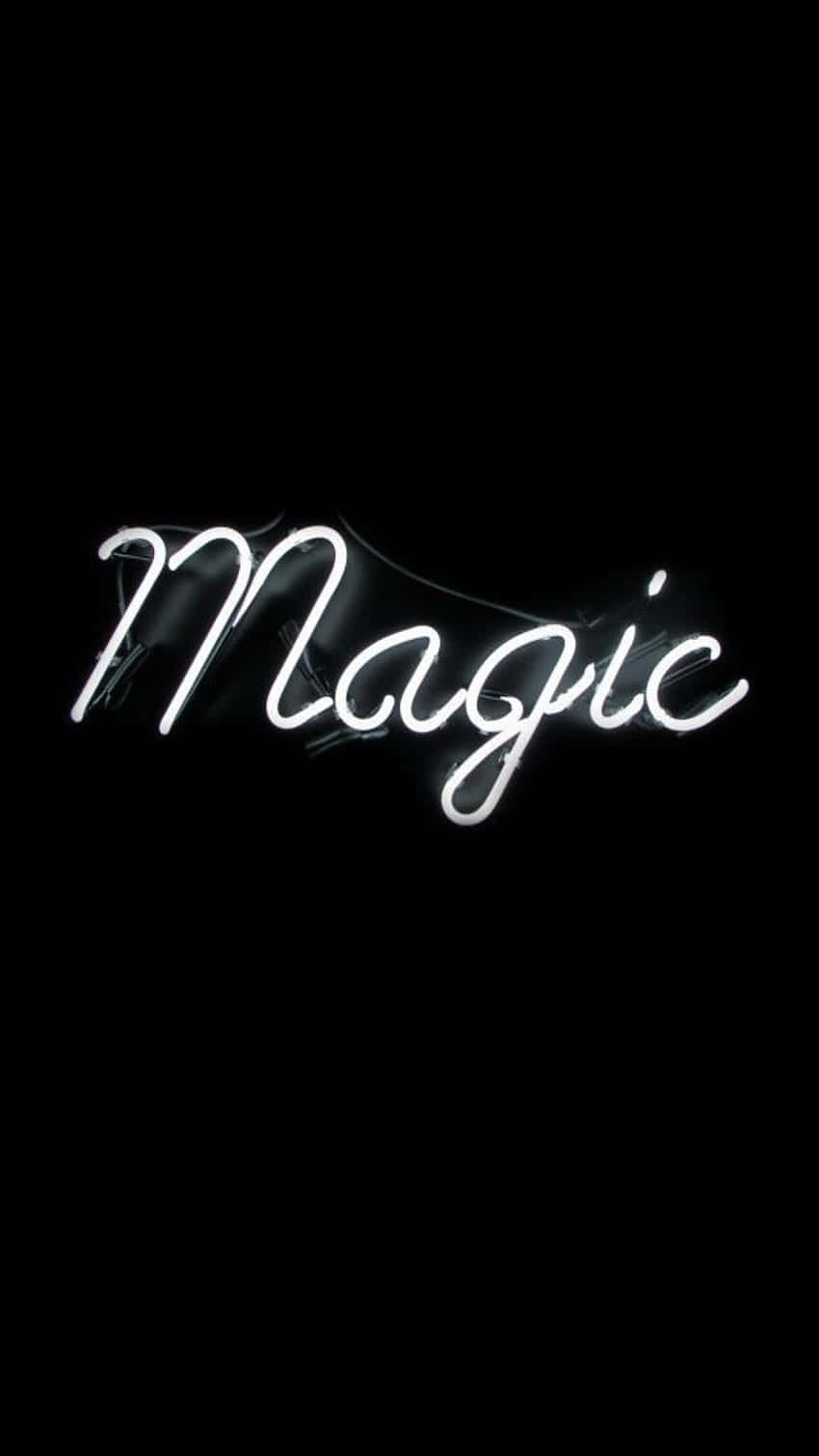 發光白色霓虹燈牌在黑色背景上寫著Magic