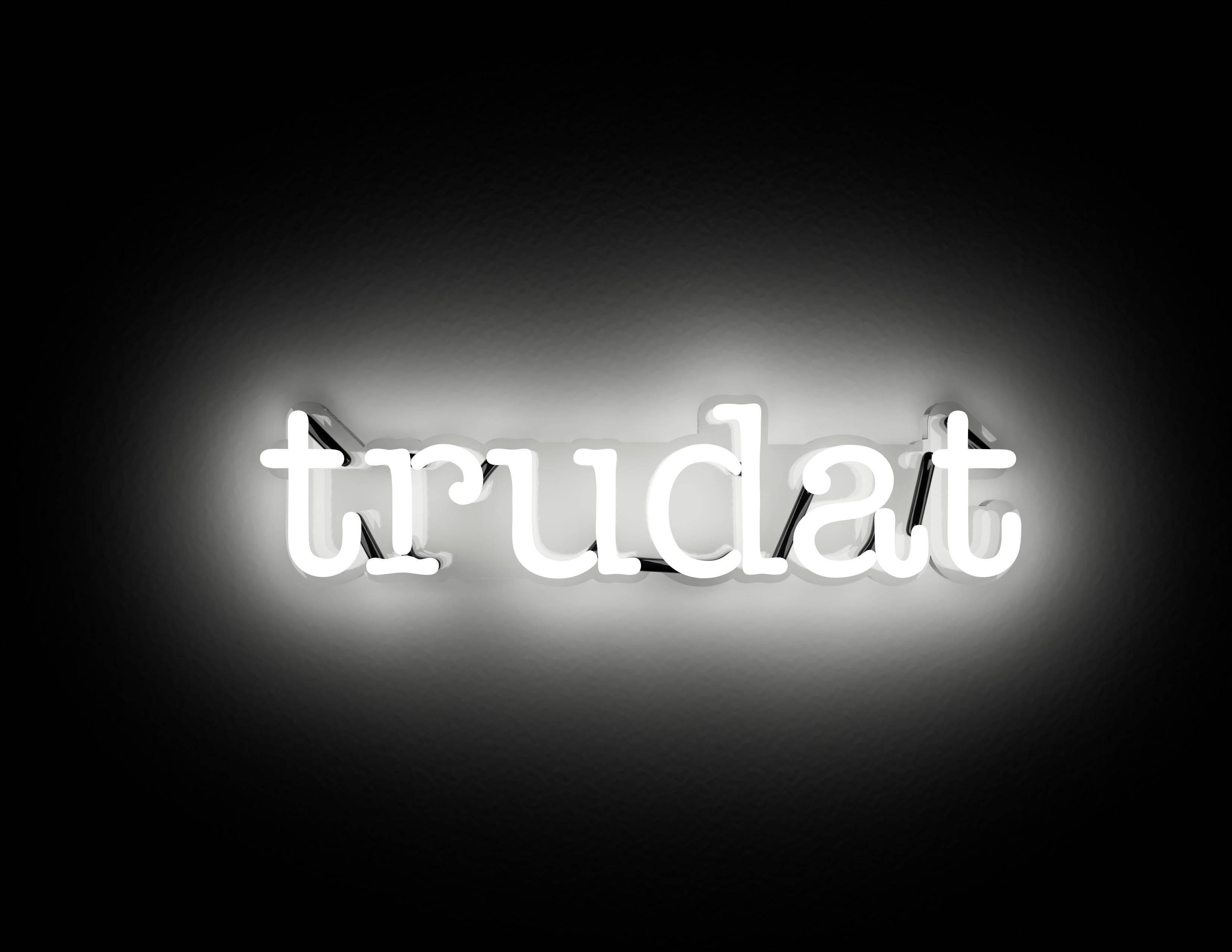 白霓虹美學 Trudat 壁紙 — 一個發光的白色霓虹燈牌，拼寫著「trudat」，在深色漸變背景上投射出柔和的光暈。