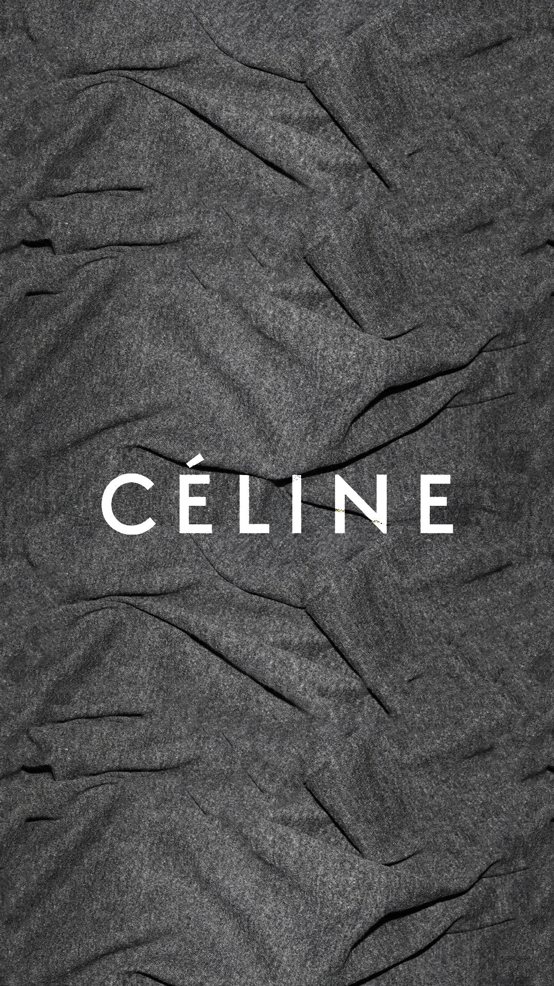 CÉLINE 標誌在質感灰色布料背景上