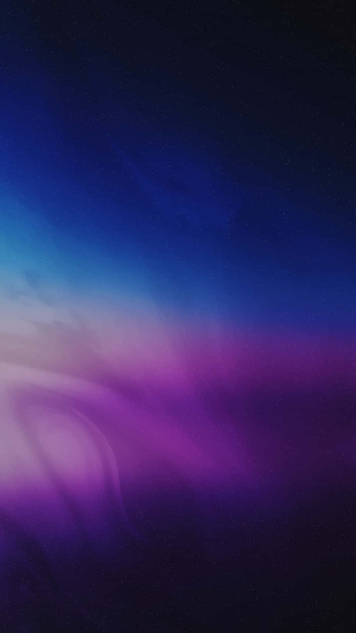 繁星點點的夜空，帶有旋轉的紫色和藍色宇宙星雲雲團。