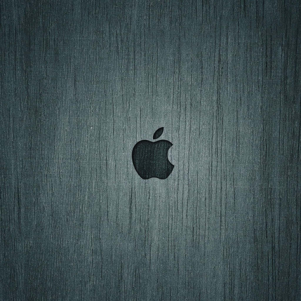 拉絲金屬背景上的黑色Apple標誌