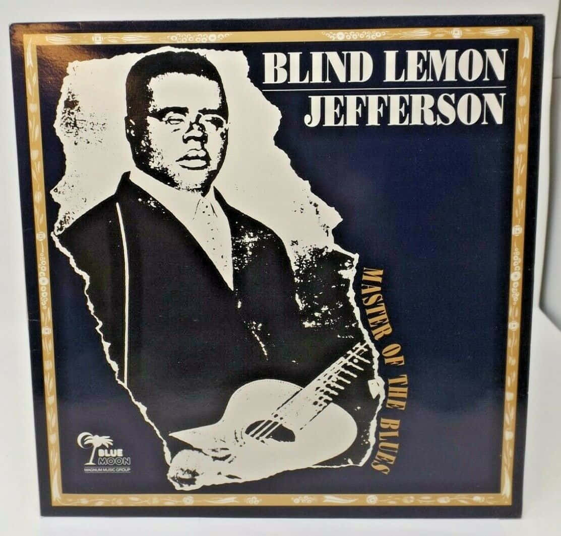 專輯封面展示 Blind Lemon Jefferson 揸住結他，有金色邊框同文字。
