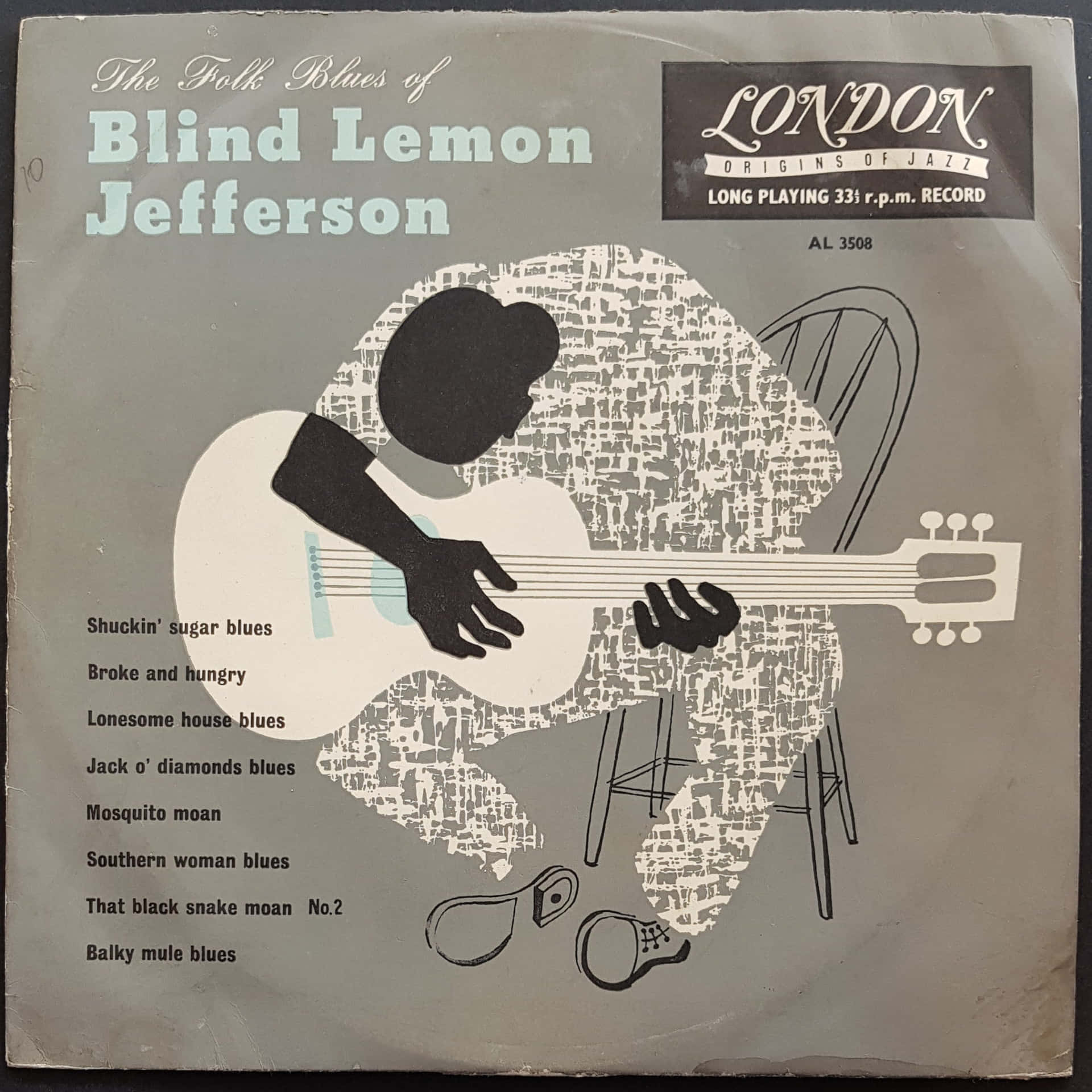Blind Lemon Jefferson 的民謠藍調唱片專輯封面，特色是坐著的吉他手剪影。