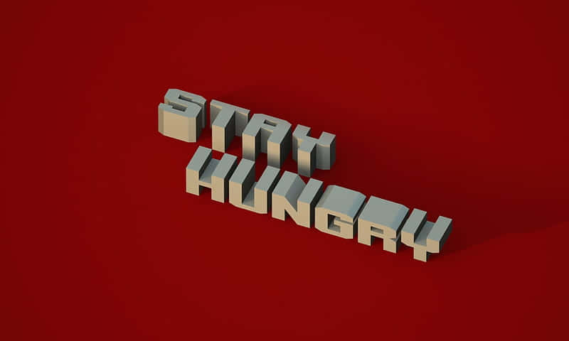 相同的精確字體風格 壁紙 — 粗體3D方塊字母拼出「STAY HUNGRY」，在深紅色背景上投下陰影。