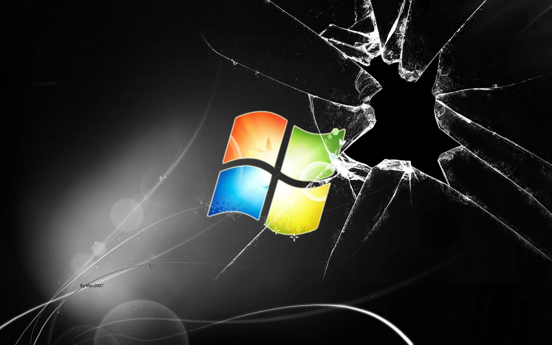 破碎的玻璃揭示了一個色彩繽紛的Windows標誌，帶有發光的光條。
