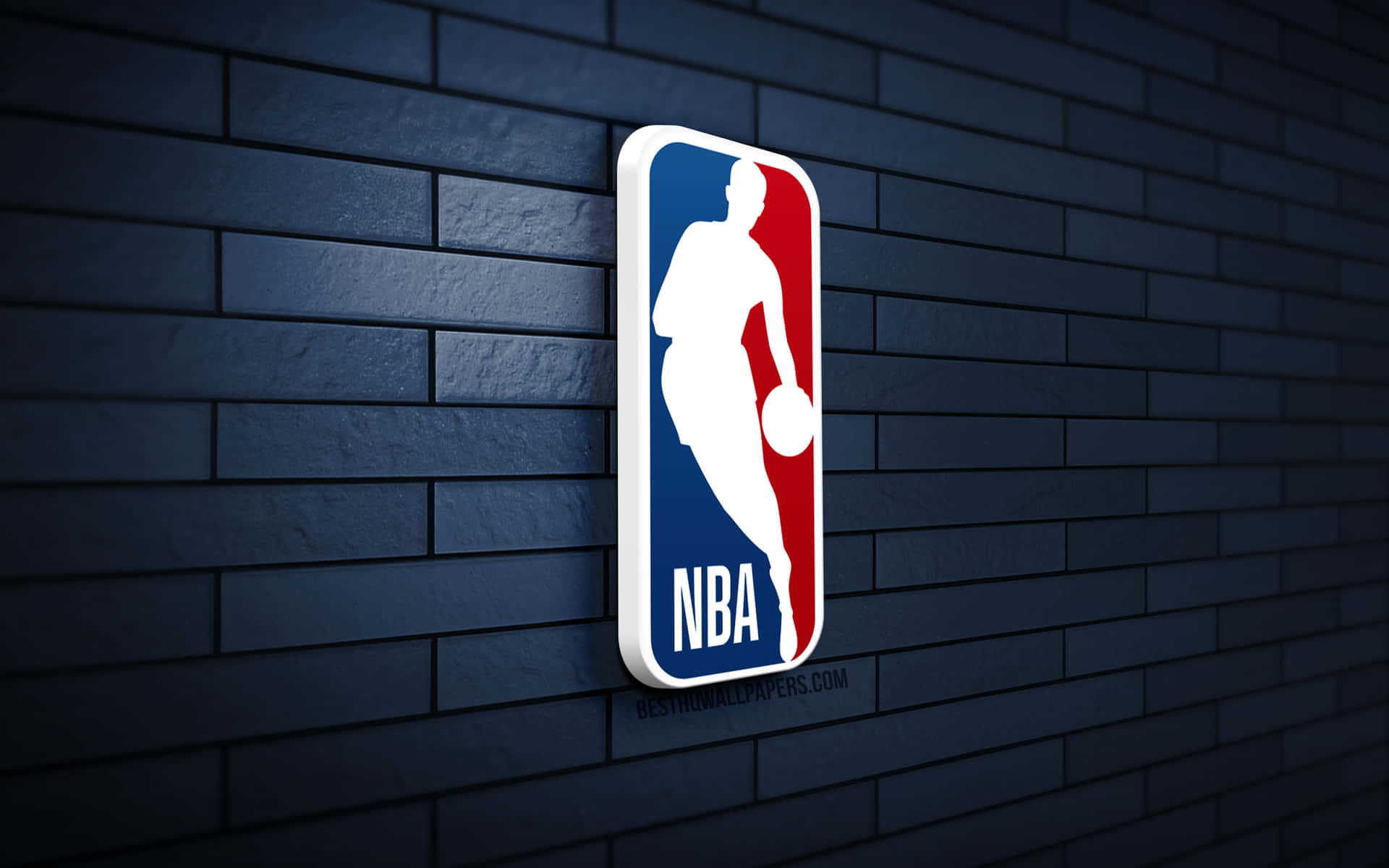 NBA 標誌安裝在帶有燈光效果的深色磚牆上。