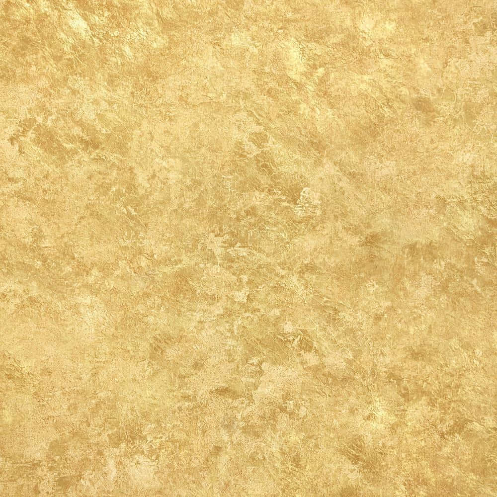 磨損風金屬金色背景 壁紙 — 一款奢華的金色紋理牆紙，帶有斑駁圖案和暖色調的細微變化。