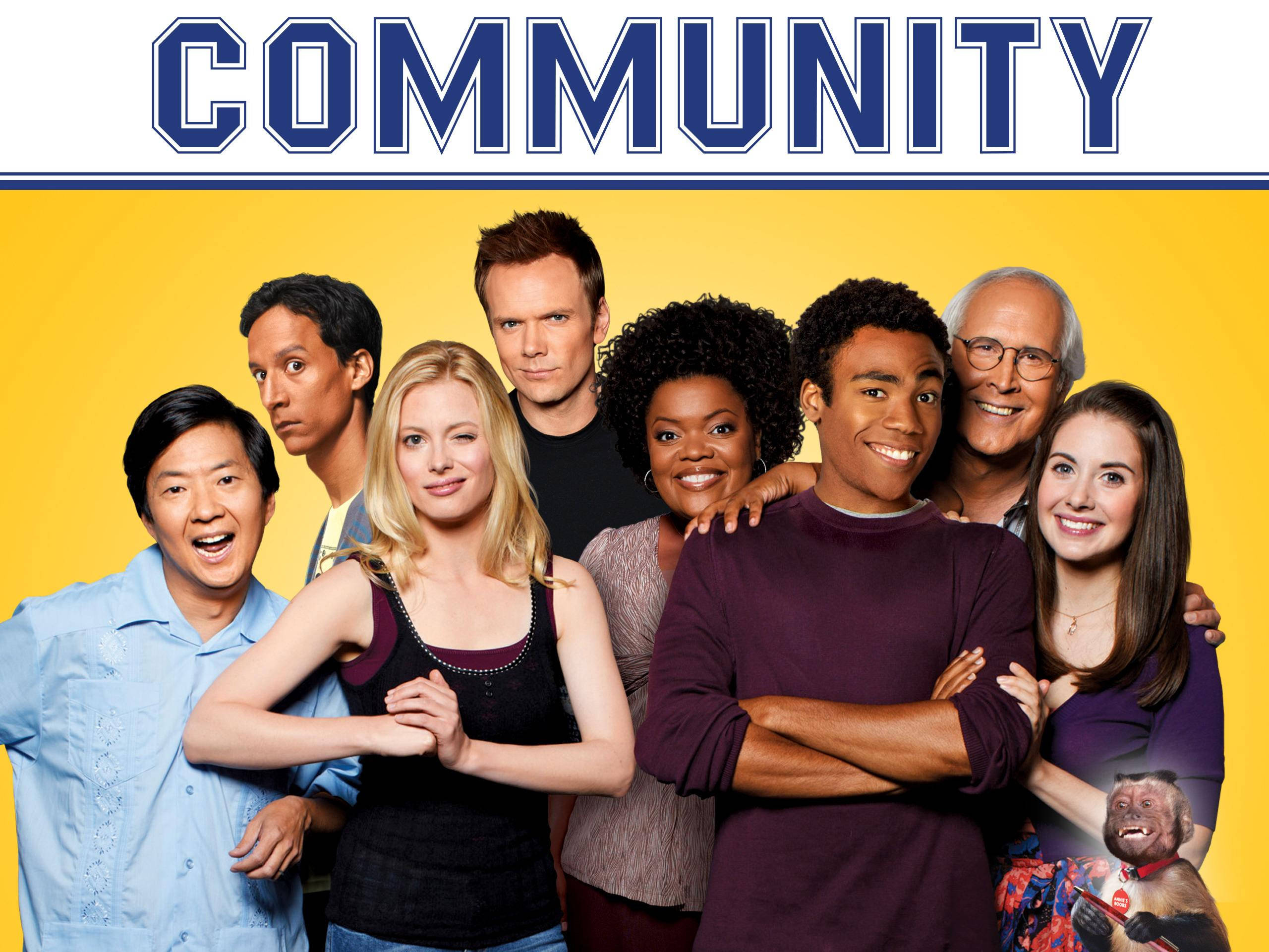 社群猴子 壁紙 — 《Community》嘅演員喺節目標題下對住明亮黃色背景開心擺甫士。