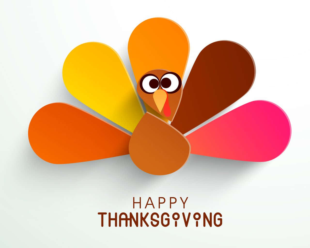 帶有「Happy Thanksgiving」文字的彩色紙火雞。