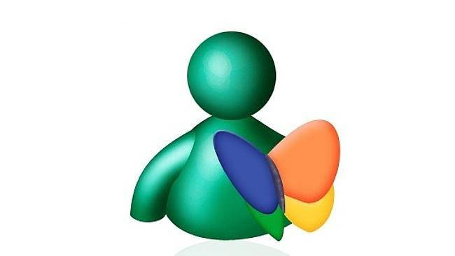 綠色3D人物圖標在白色背景上拿著色彩繽紛的形狀