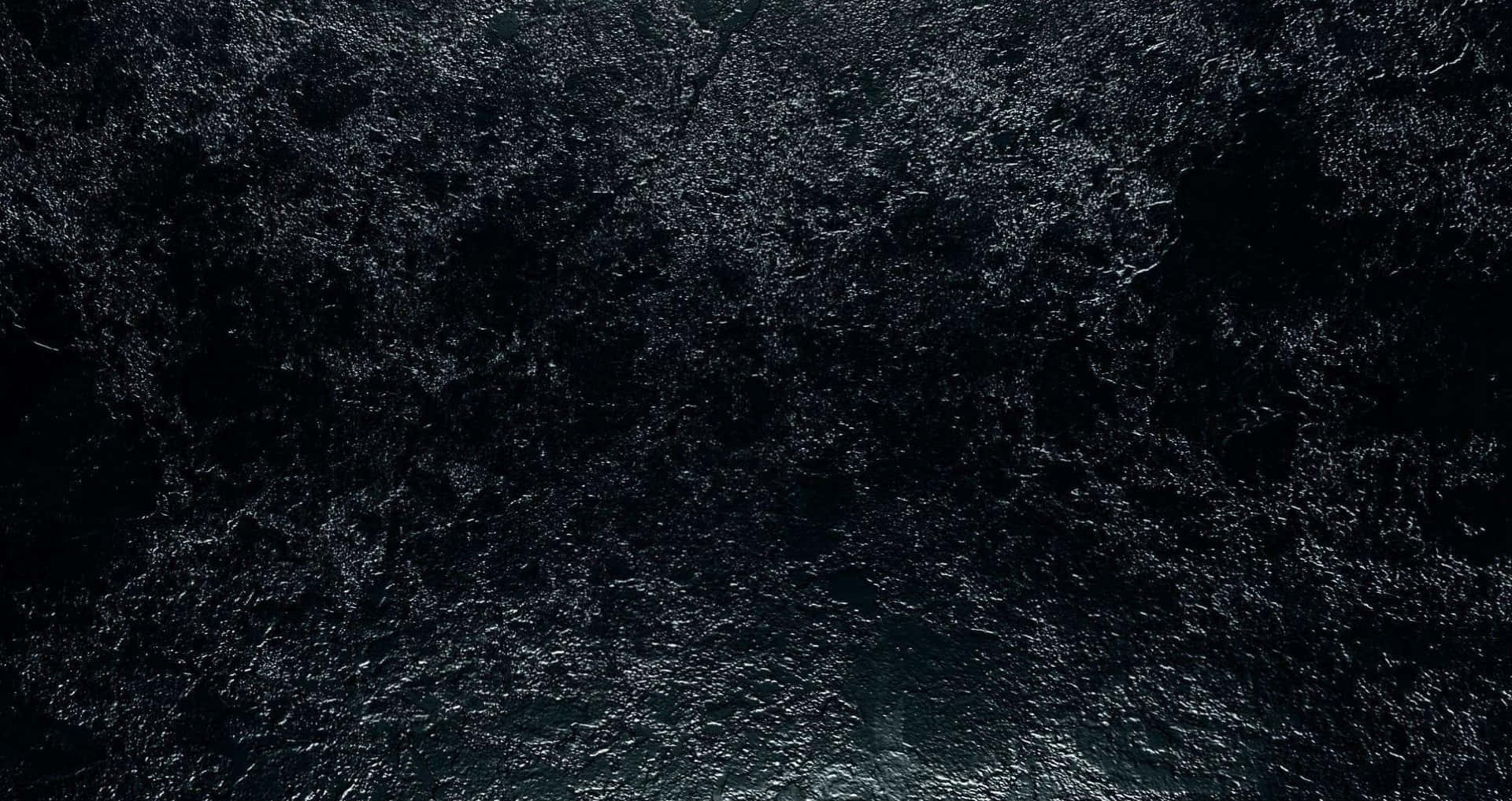 神秘之美：黑色紋理背景 壁紙 — 深色紋理表面，帶有微妙的閃爍亮點，營造出神秘的抽象圖案。