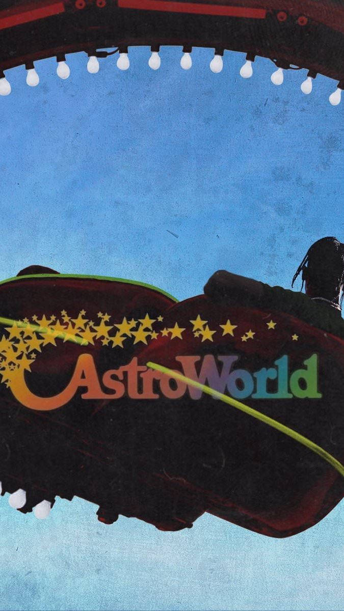 夜間燈串下帶有AstroWorld標誌和星星的過山車。