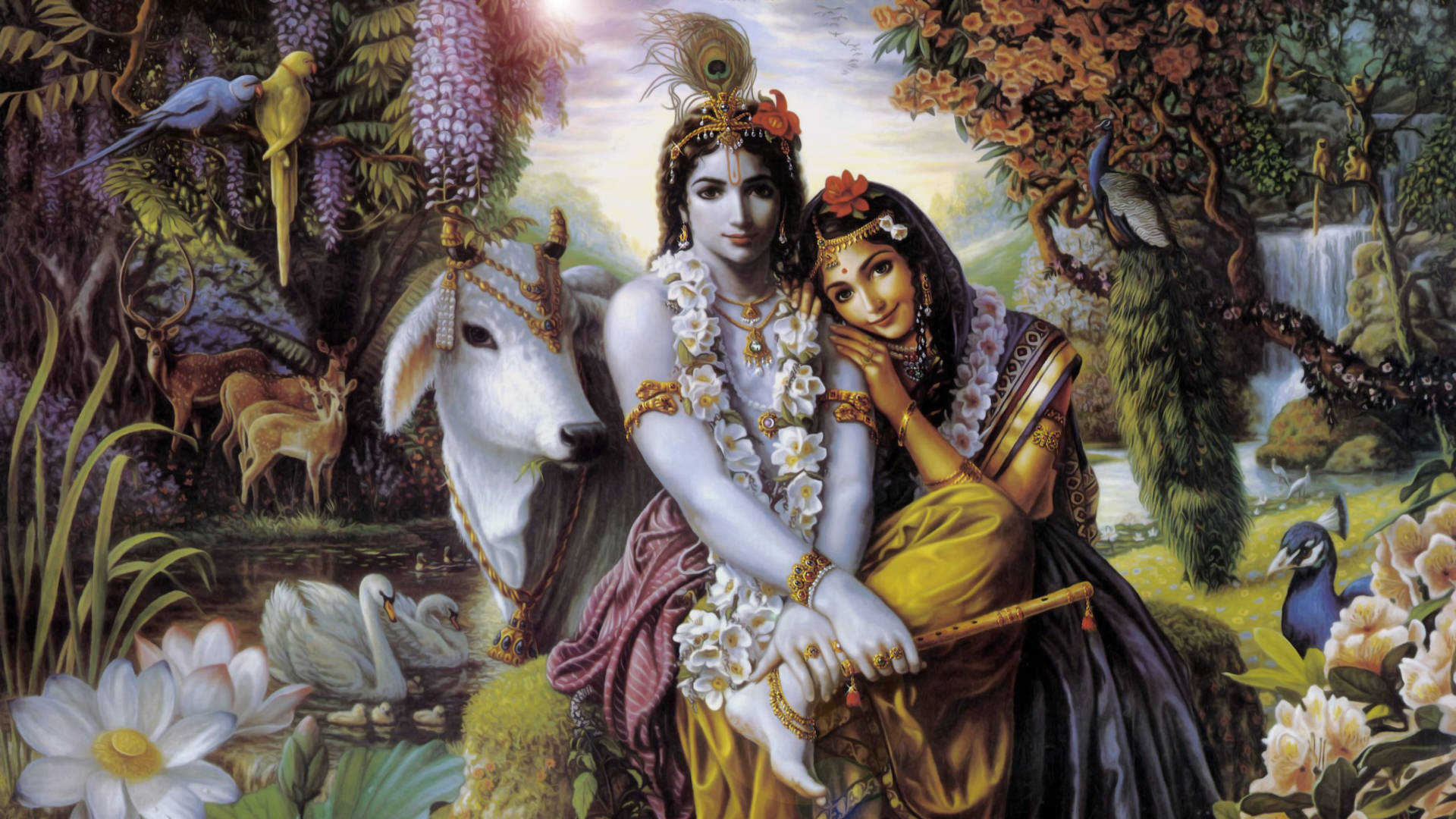 Krishna Desktop 桌布 壁紙 — 神聖情侶克里希納和拉妲坐在一個茂盛的花園中，有孔雀、鹿和天鵝，在明亮的天空下。