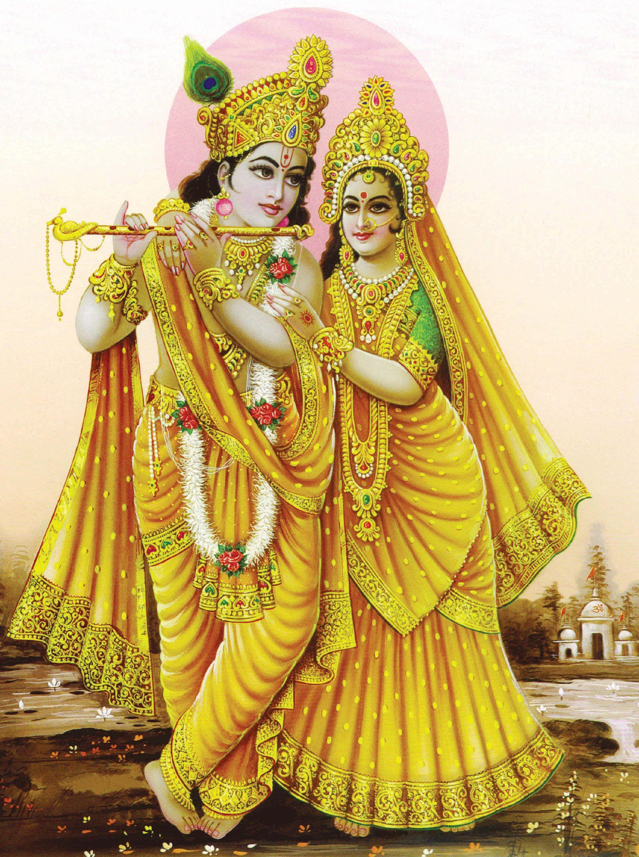 Radha Krishna 桌布 壁紙 — 神聖情侶克里希納和拉達身著閃耀金色服飾，在柔和粉紅光暈下，佩戴精緻珠寶和花環共舞。