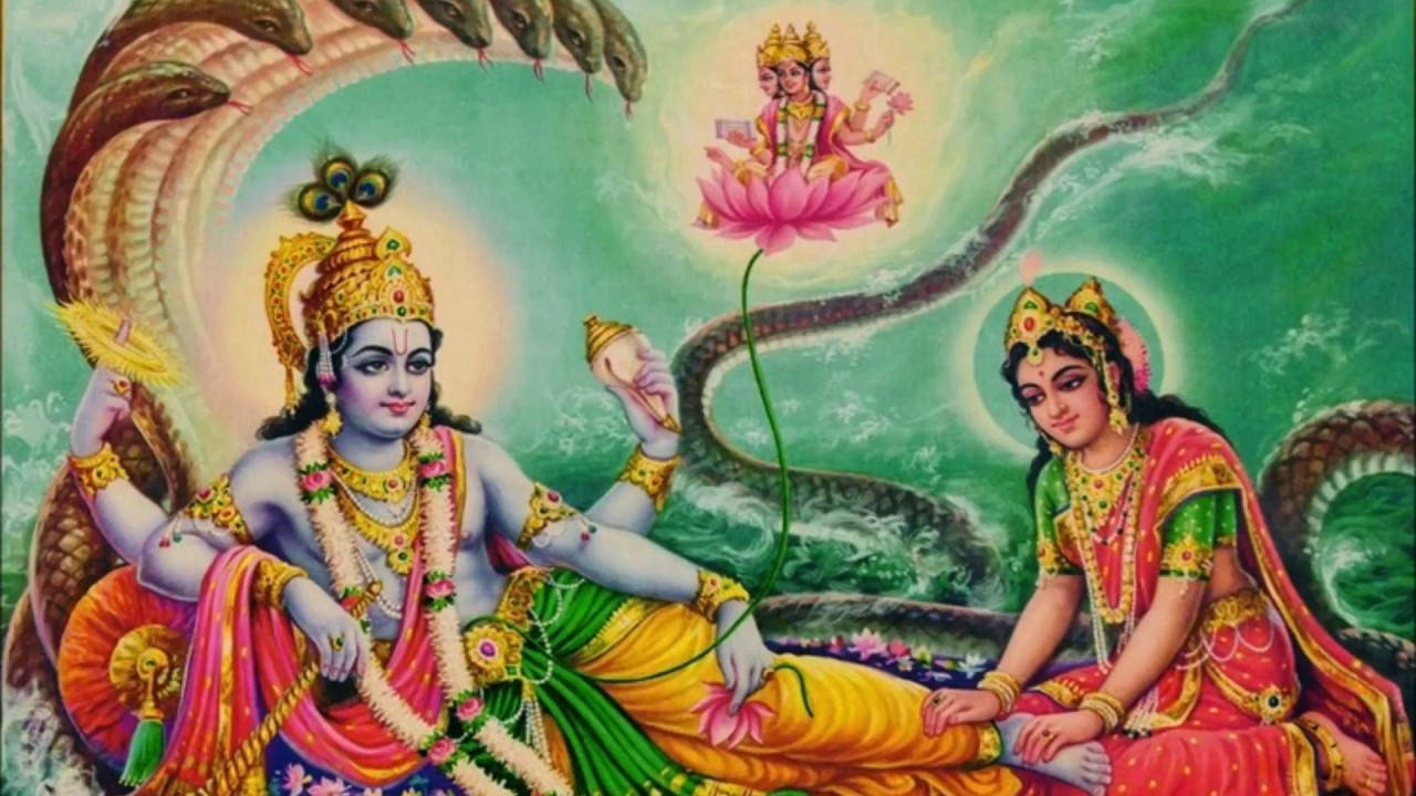 Lakshmi 桌布 壁紙 — 神聖的人物身穿鮮豔長袍，安詳地坐在盤繞的蛇上，上方有蓮花承載的神祇，背景是天堂般的綠色。