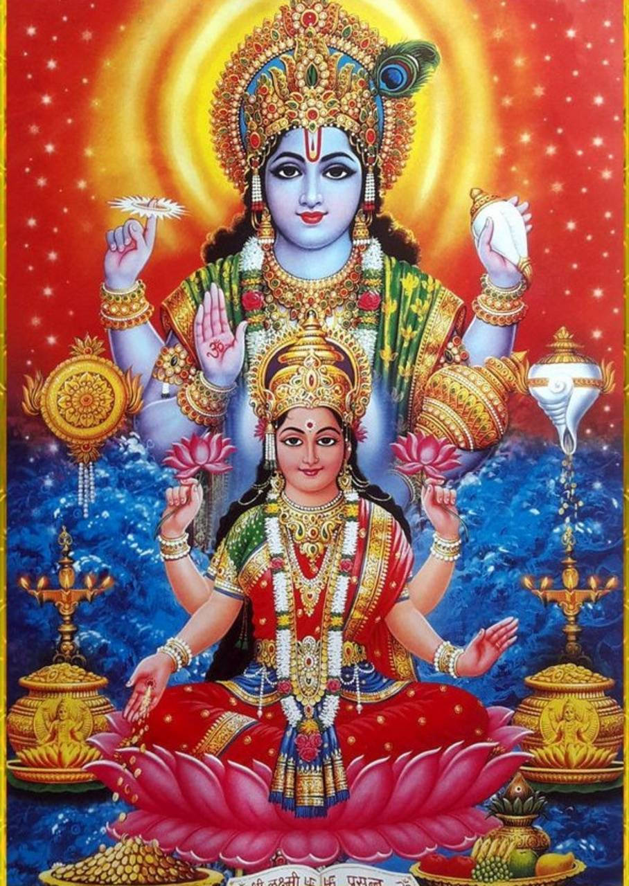 Lakshmi 桌布 壁紙 — 神聖的印度教女神們優雅地坐在粉紅色蓮花上，背景是飾有金色裝飾和星星的耀眼紅藍宇宙背景。