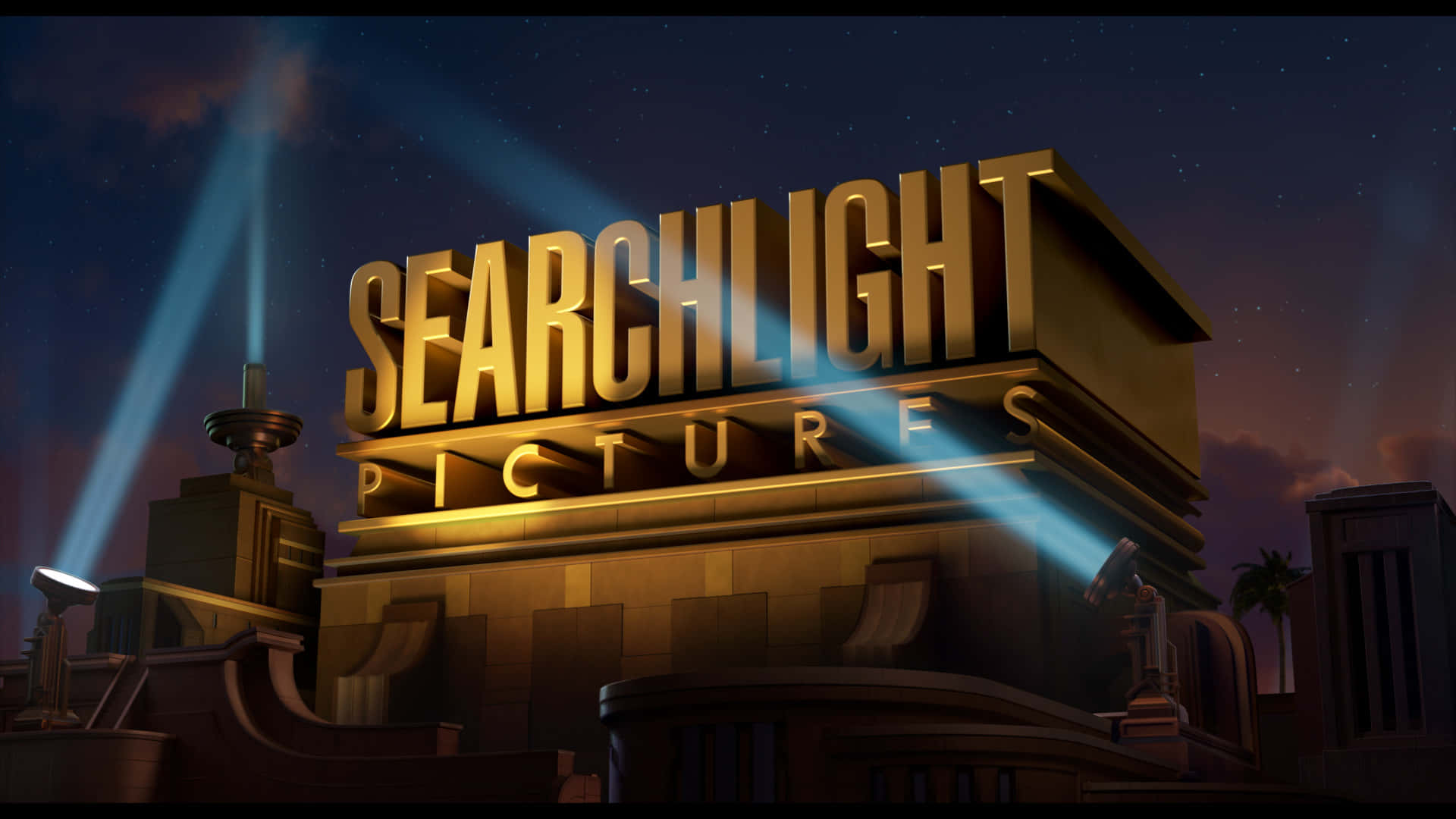 Searchlight Pictures 標誌在夜間聚光燈下發光。