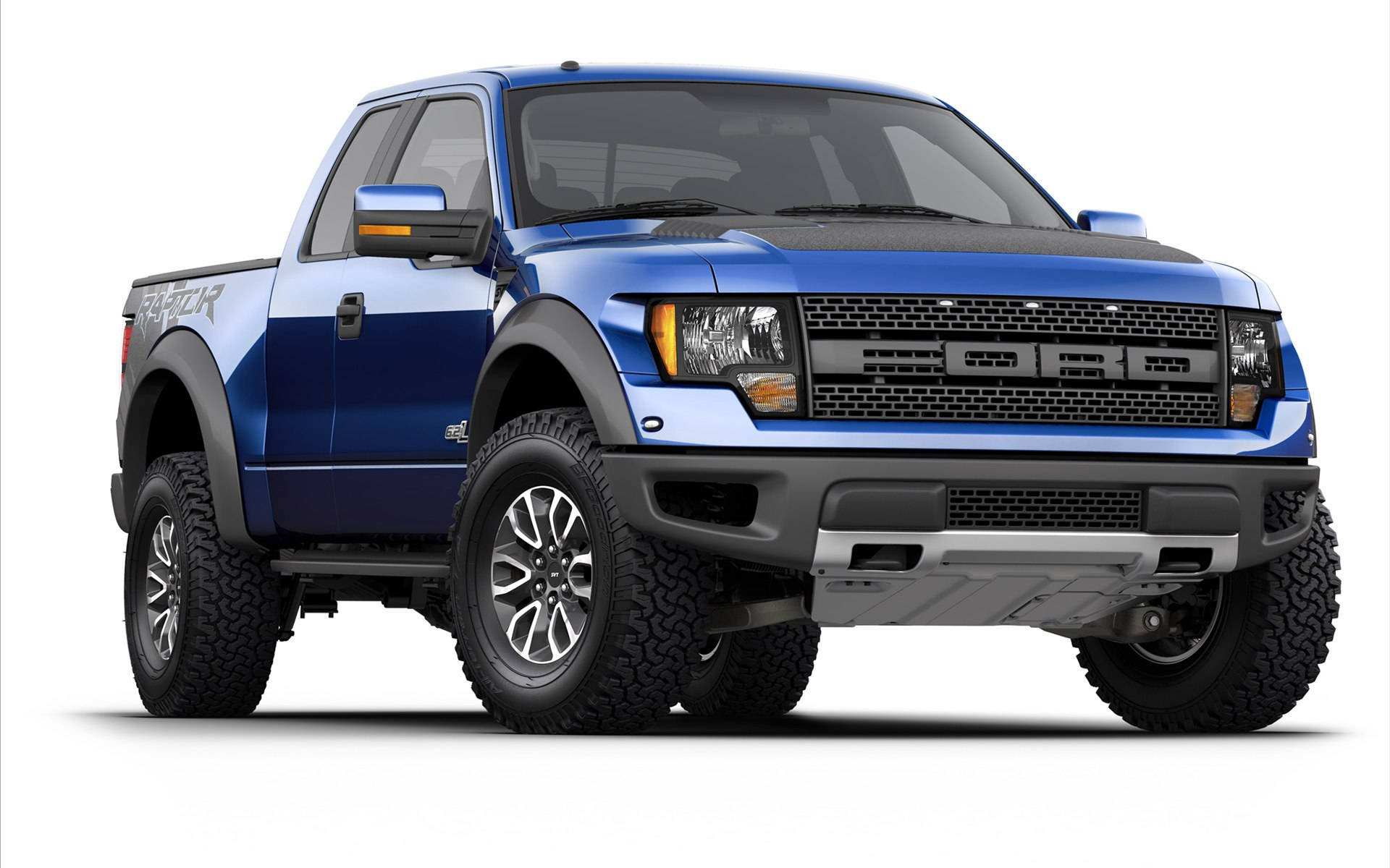 福特Raptor F-150皮卡 壁紙 — 一架大膽的藍色福特F-150 Raptor皮卡車，帶有黑色飾件和大型越野輪胎，立在潔白背景前。