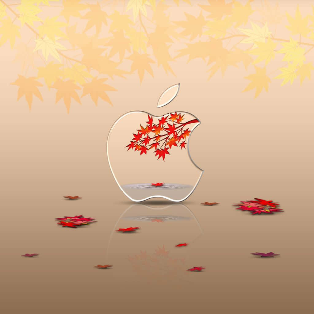 Apple標誌充滿紅色楓葉和落在反光表面上的秋季落葉。