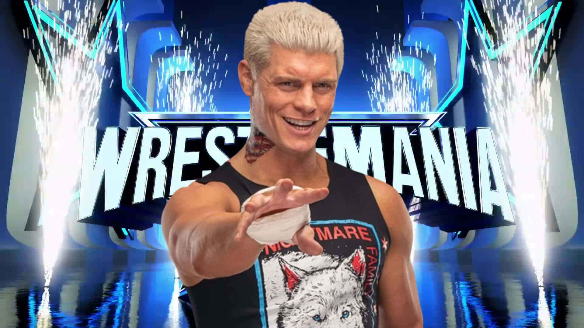 摔角手穿著狼圖案背心，在WrestleMania舞台上微笑並做手勢，背景有藍色燈光和閃光。