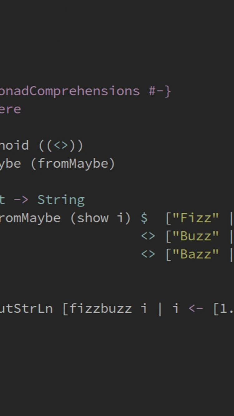 深色編輯器中的 Haskell FizzBuzz 代碼，帶有彩色語法高亮。