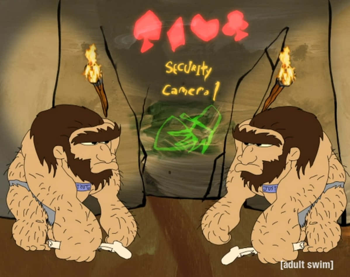 兩個手持火炬的穴居人在洞穴裡看著一個監控攝像頭。