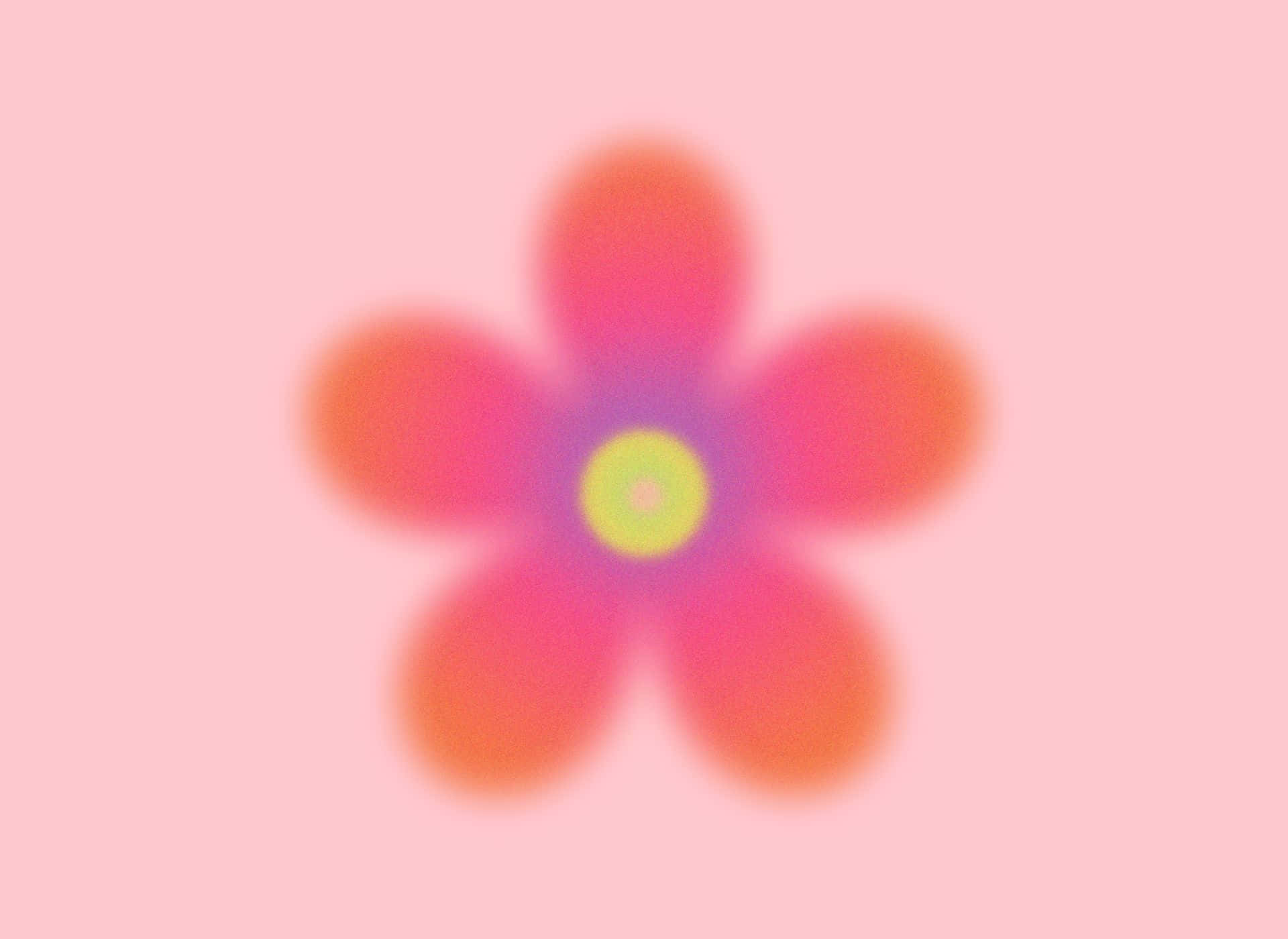 空靈宇宙光暈 壁紙 — 一朵柔和模糊的花，帶有粉橙色花瓣和黃色花蕊，漂浮在粉彩粉紅背景上。