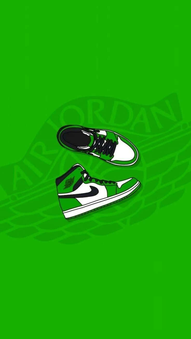 綠色和白色的Air Jordan運動鞋漂浮在帶有模糊品牌的綠色背景上。
