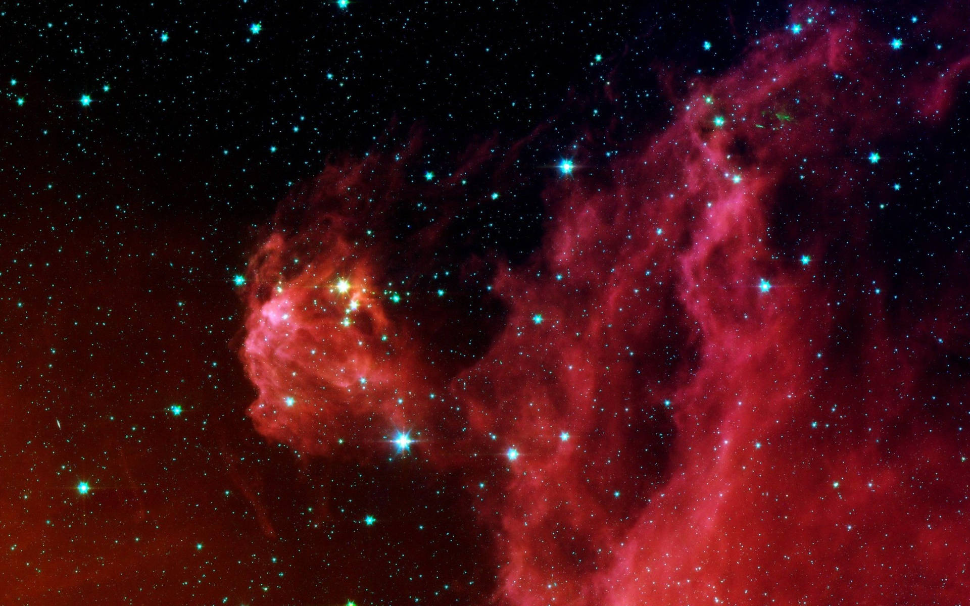 在深空中充滿星星的發光紅色和藍綠色星雲。