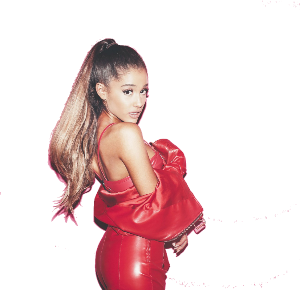 穿紅色服裝的流行歌手姿勢 壁紙 — Ariana Grande 身穿閃亮紅色服裝，在黑色背景前擺姿勢，帶有閃爍的軌跡效果。