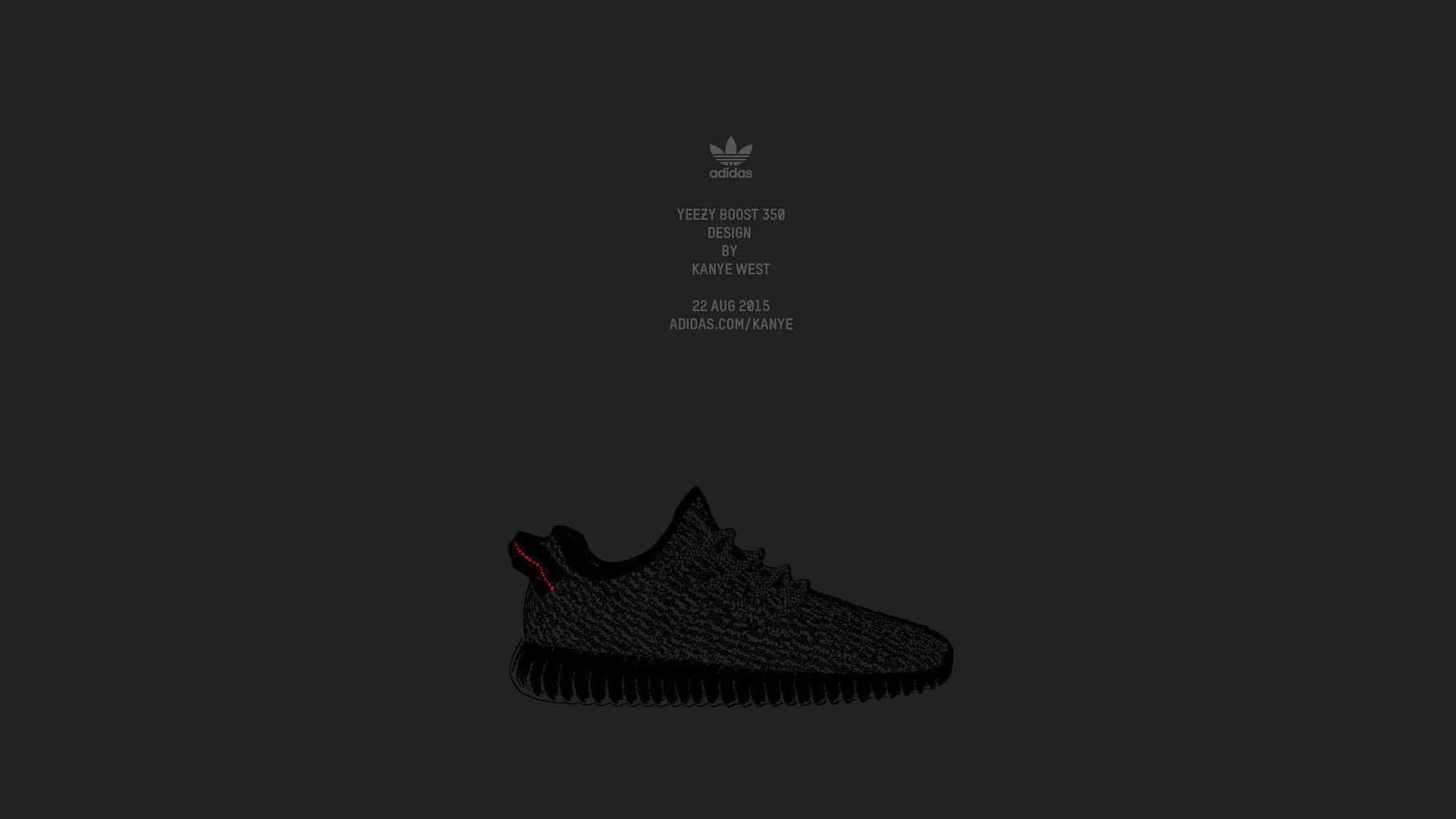 黑色Yeezy Boost 350運動鞋，帶紅色細節，置於深灰色背景上，配有白色文字。
