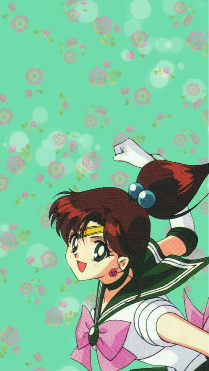 sailor jupiter 桌布 壁紙 — 穿著水手服的動漫女孩在薄荷綠色花卉背景和散景效果中愉快地微笑。