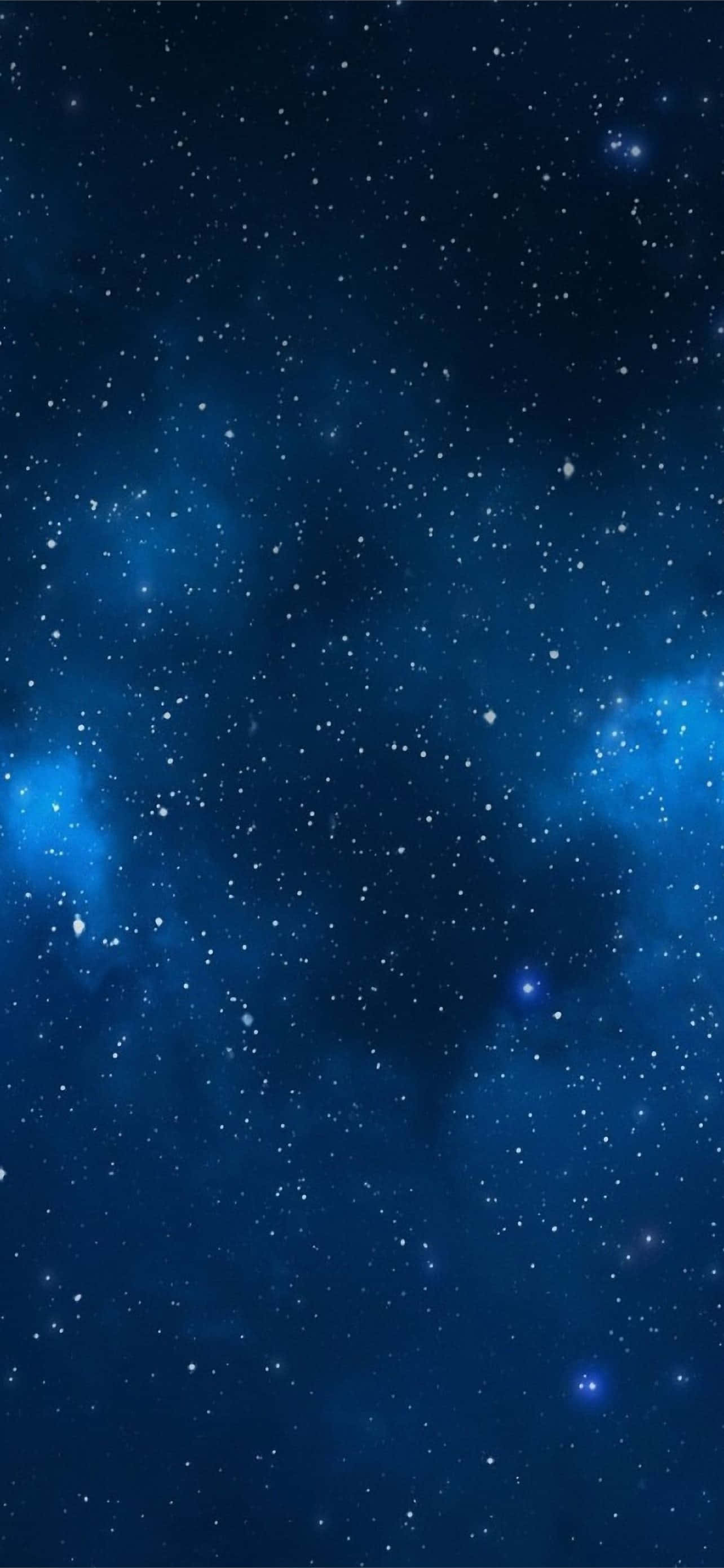 穿越涼藍星系的星海與星光 壁紙 — 廣闊的宇宙空間，充滿閃爍的星星和發光的藍色星雲，背景是深靛藍色的虛空。