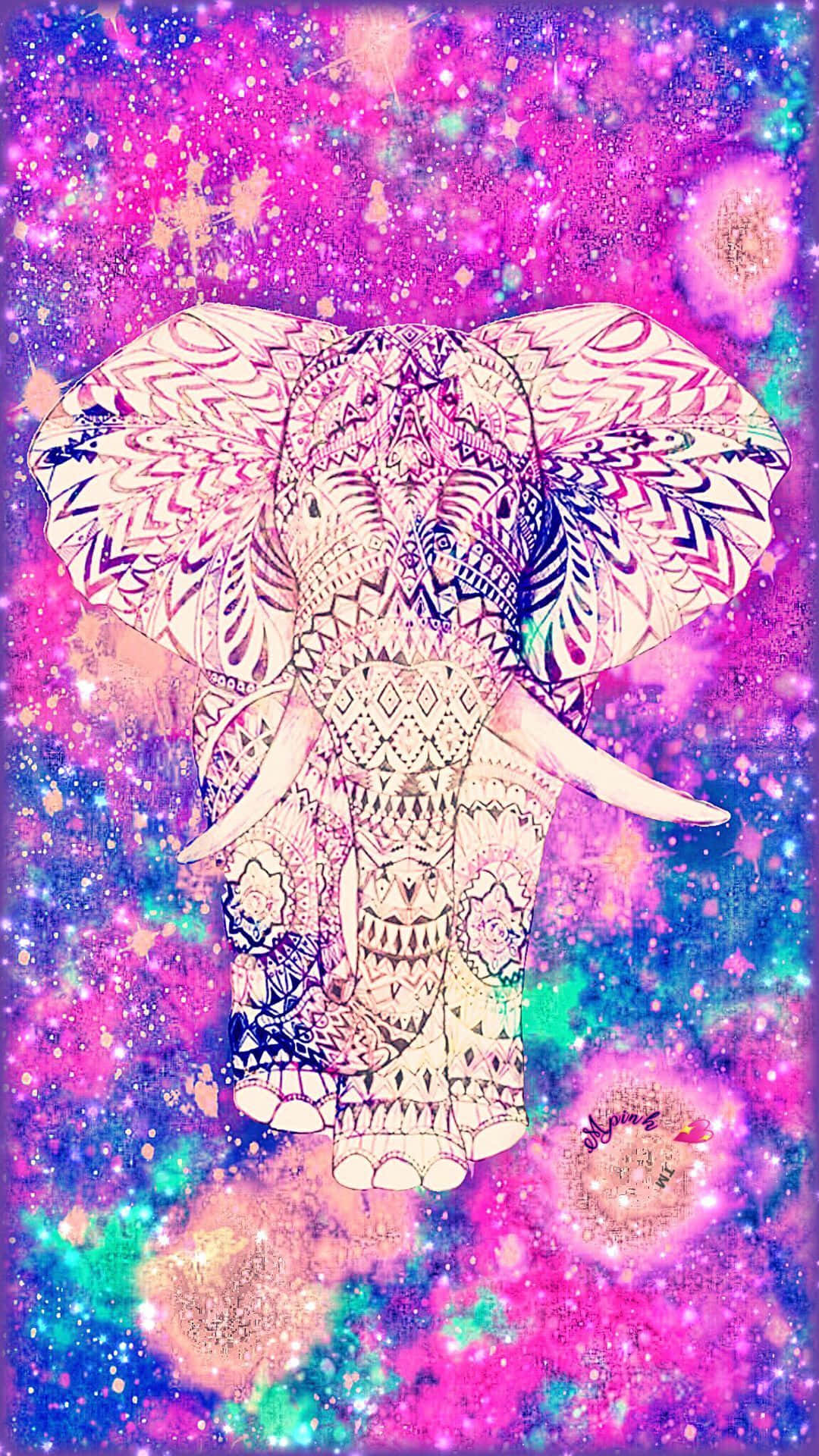 穿越閃耀宇宙的旅程 壁紙 — 一個圖案複雜的大象頭漂浮在充滿粉紅色、紫色和藍綠色星星的鮮豔宇宙星雲中。